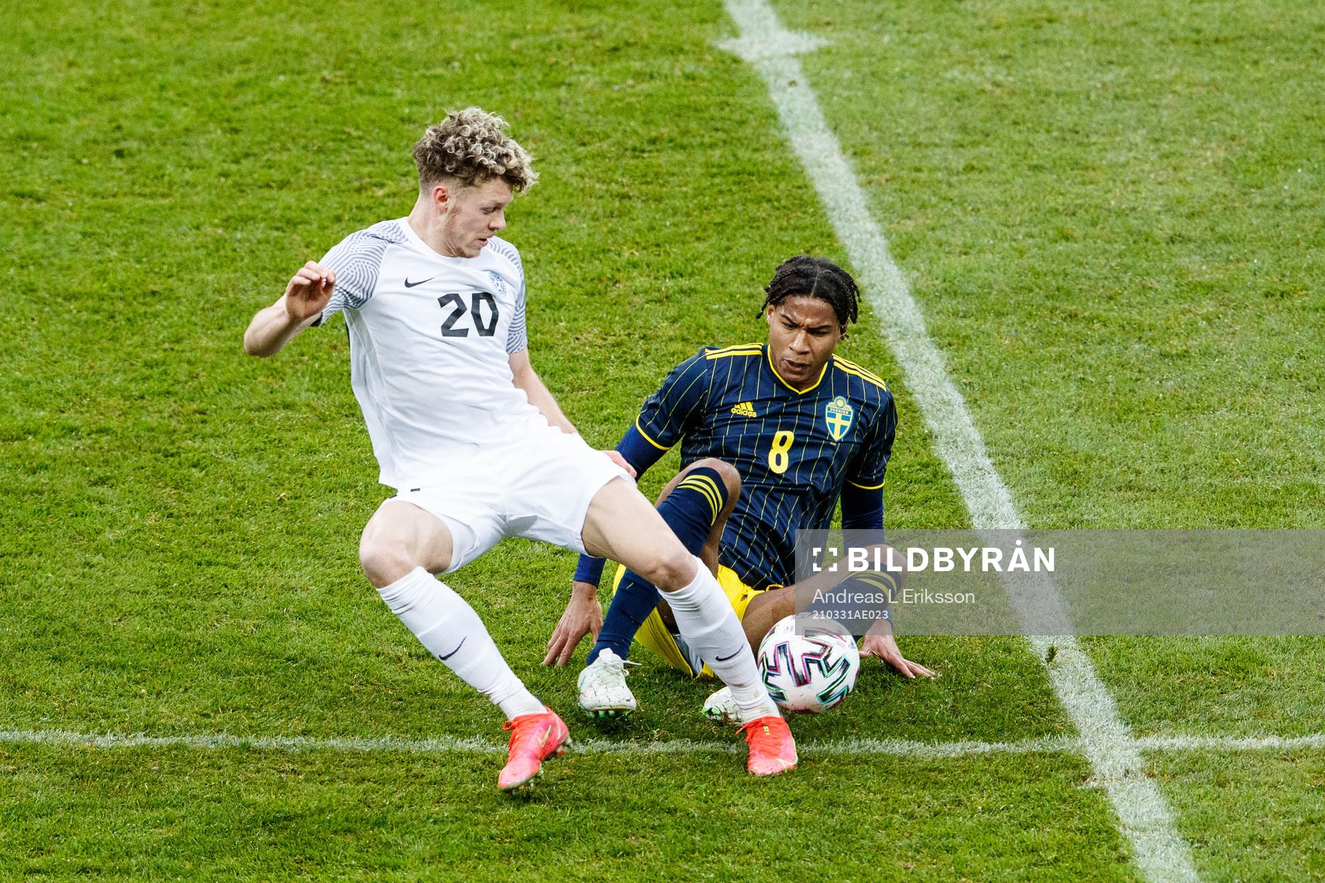 Markus Poom of Estonia and Jens-Lys Cajuste of Sweden