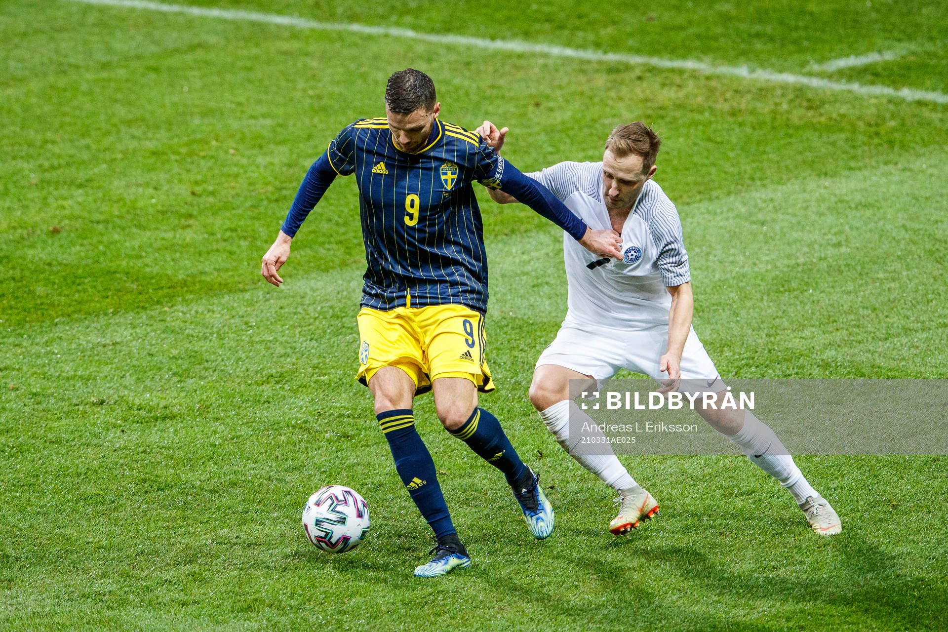 Marcus Berg of Sweden and Sander Puri of Estonia