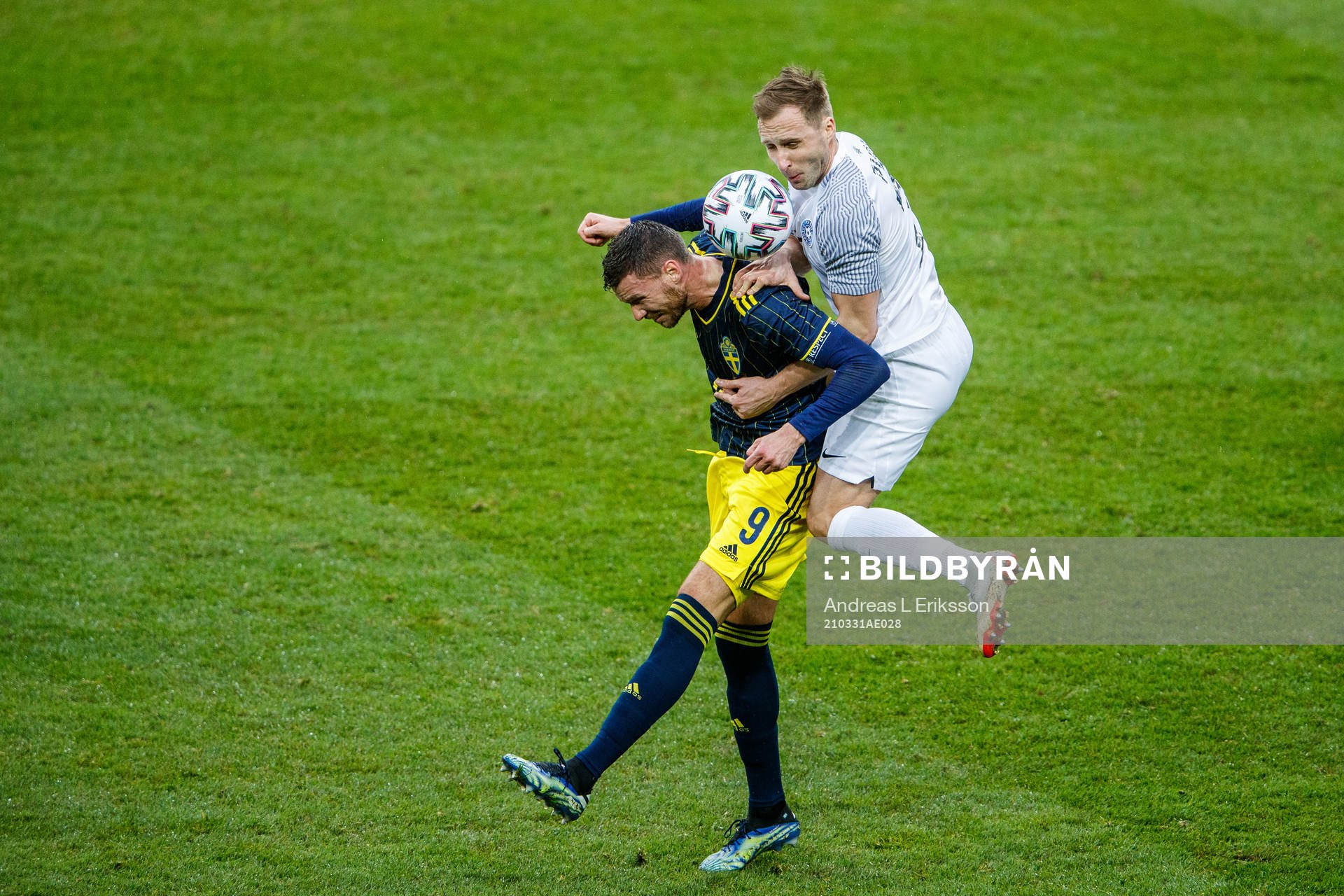 Marcus Berg of Sweden and Sander Puri of Estonia