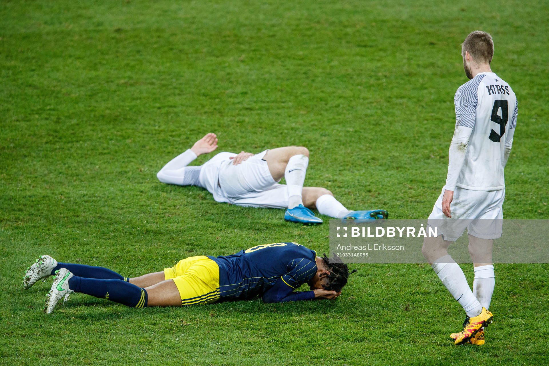 Jens-Lys Cajuste of Sweden and Henri Anier of Estonia in