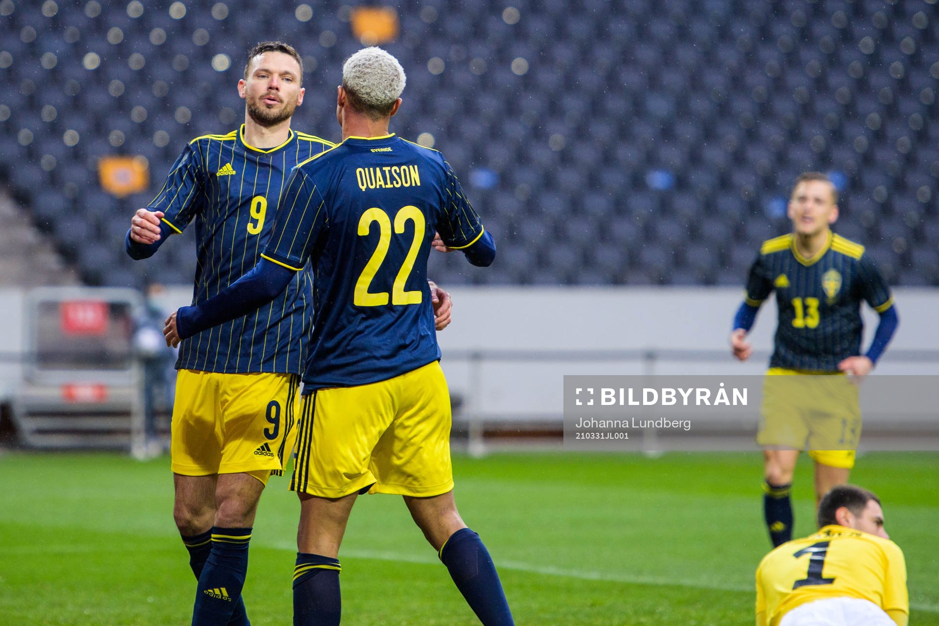 Marcus Berg and Robin Quaison of Sweden celebrate
