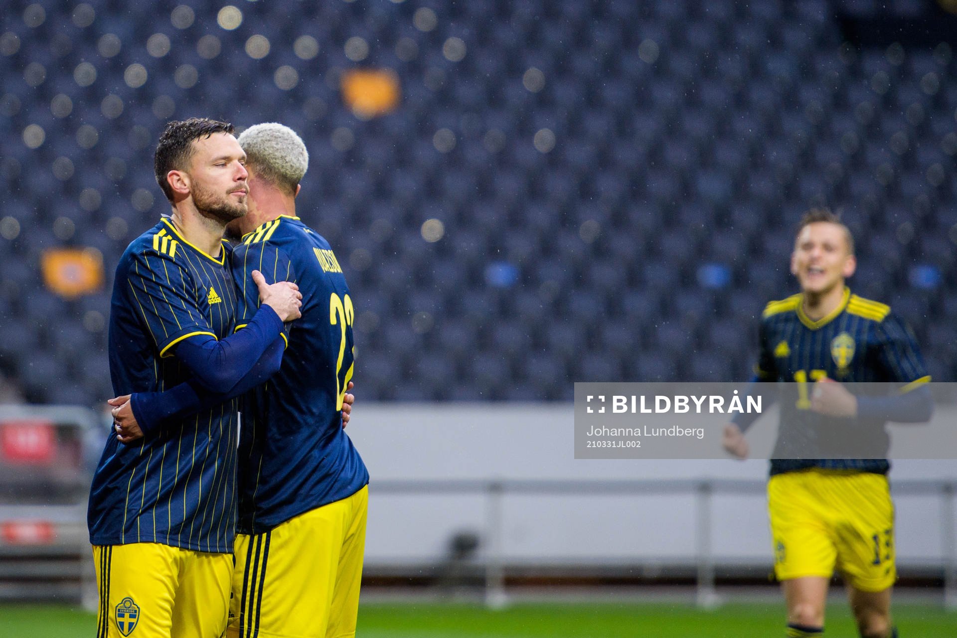Marcus Berg and Robin Quaison of Sweden celebrate