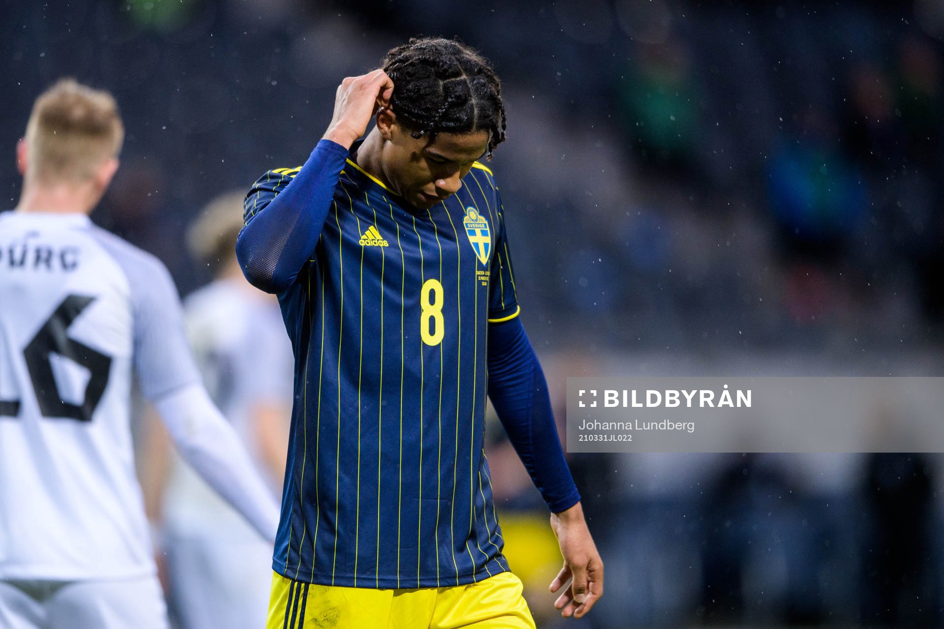 Jens-Lys Cajuste of Sweden looks dejected
