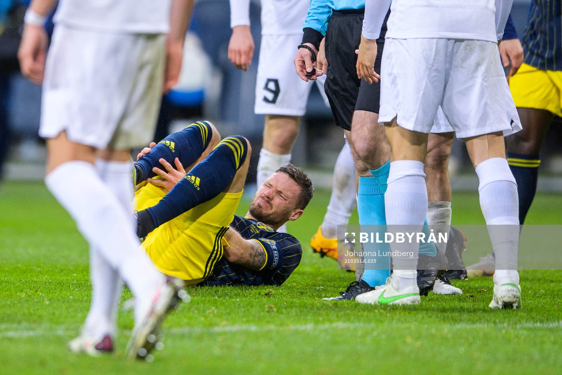 Marcus Berg of Sweden is in pain