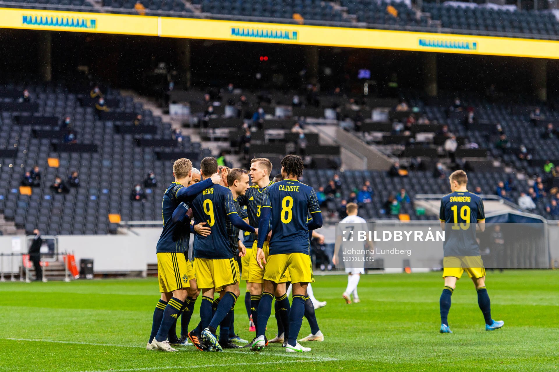 Marcus Berg celebrates with Jens-Lys Cajuste, Robin Quaison