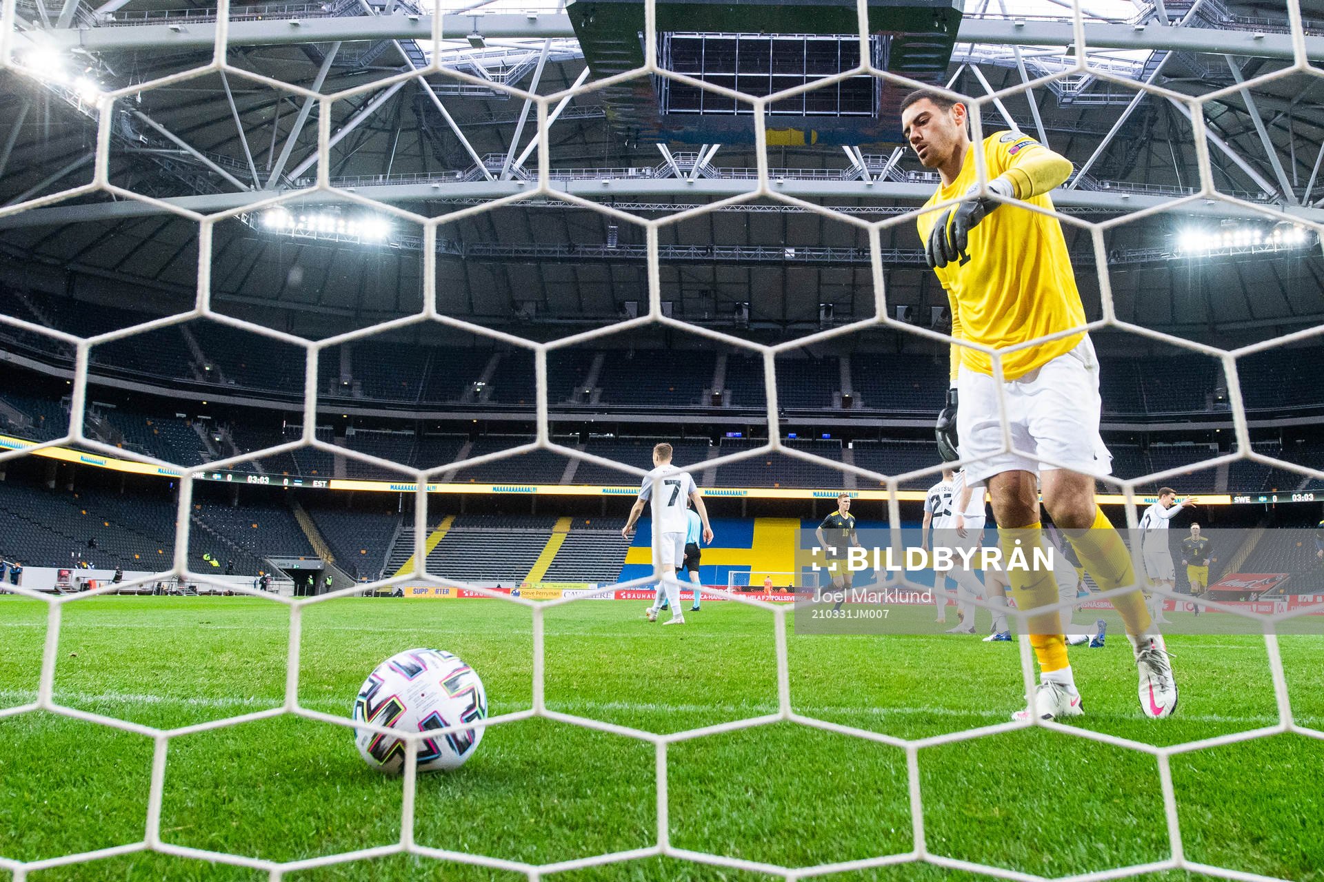 Goalkeeper Matvei Igonen of Estonia looks dejected