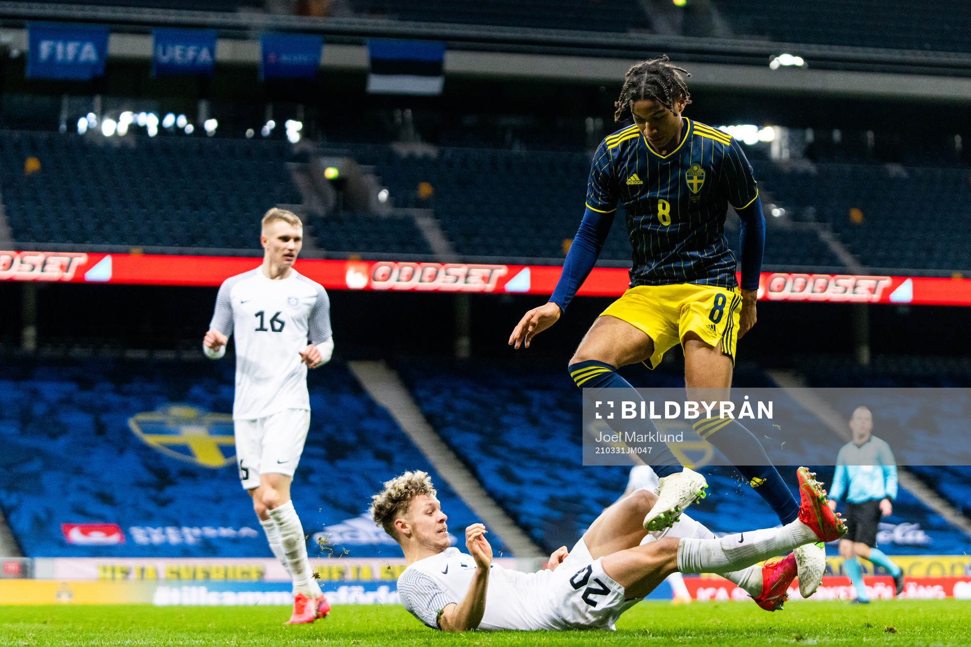 Markus Poom of Estonia and Jens-Lys Cajuste of Sweden