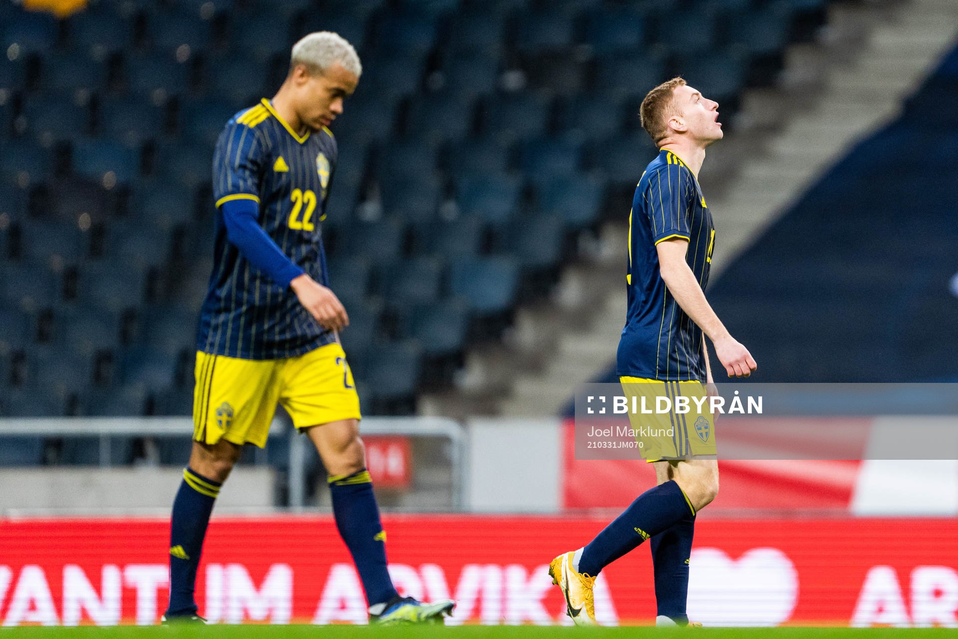 Robin Quaison and Dejan Kulusevski of Sweden look dejected