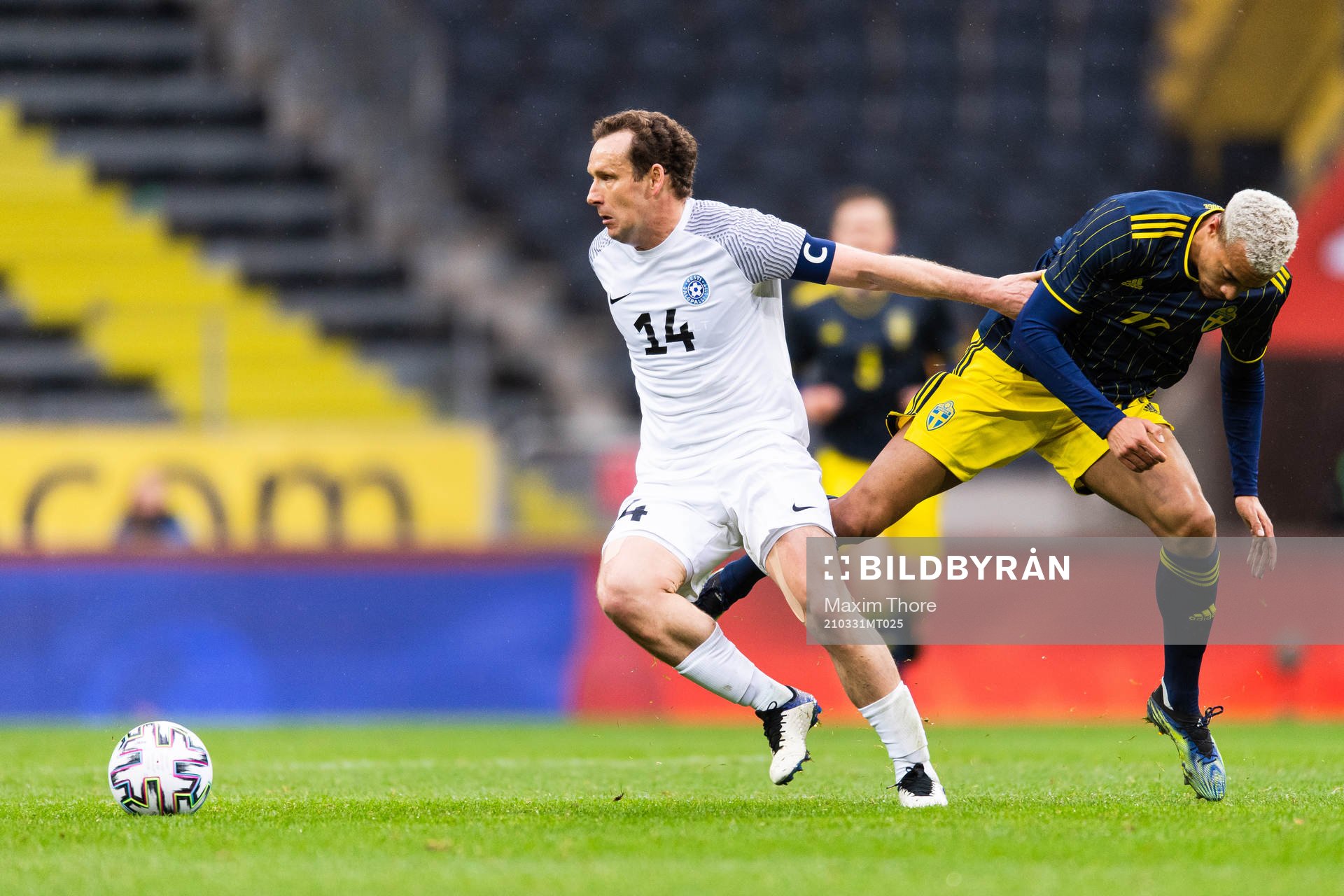 Konstantin Vassiljev of Estonia and Robin Quaison of Sweden