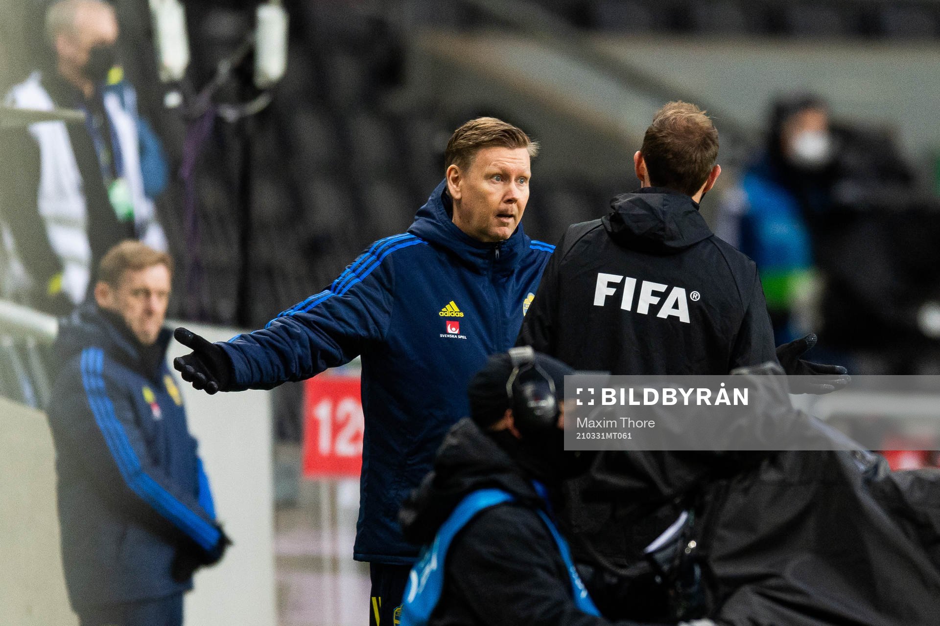 Assistant coach Peter Wettergren of Sweden talks to the