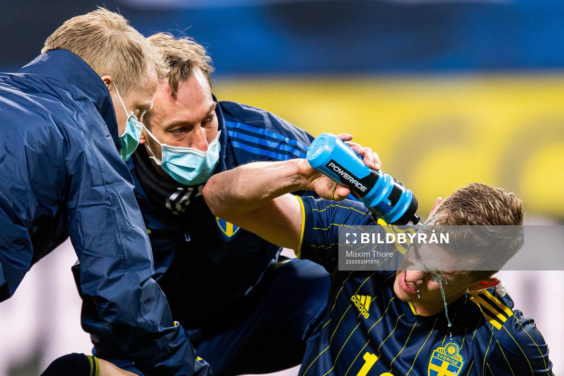 Emil Krafth of Sweden receives medical attention