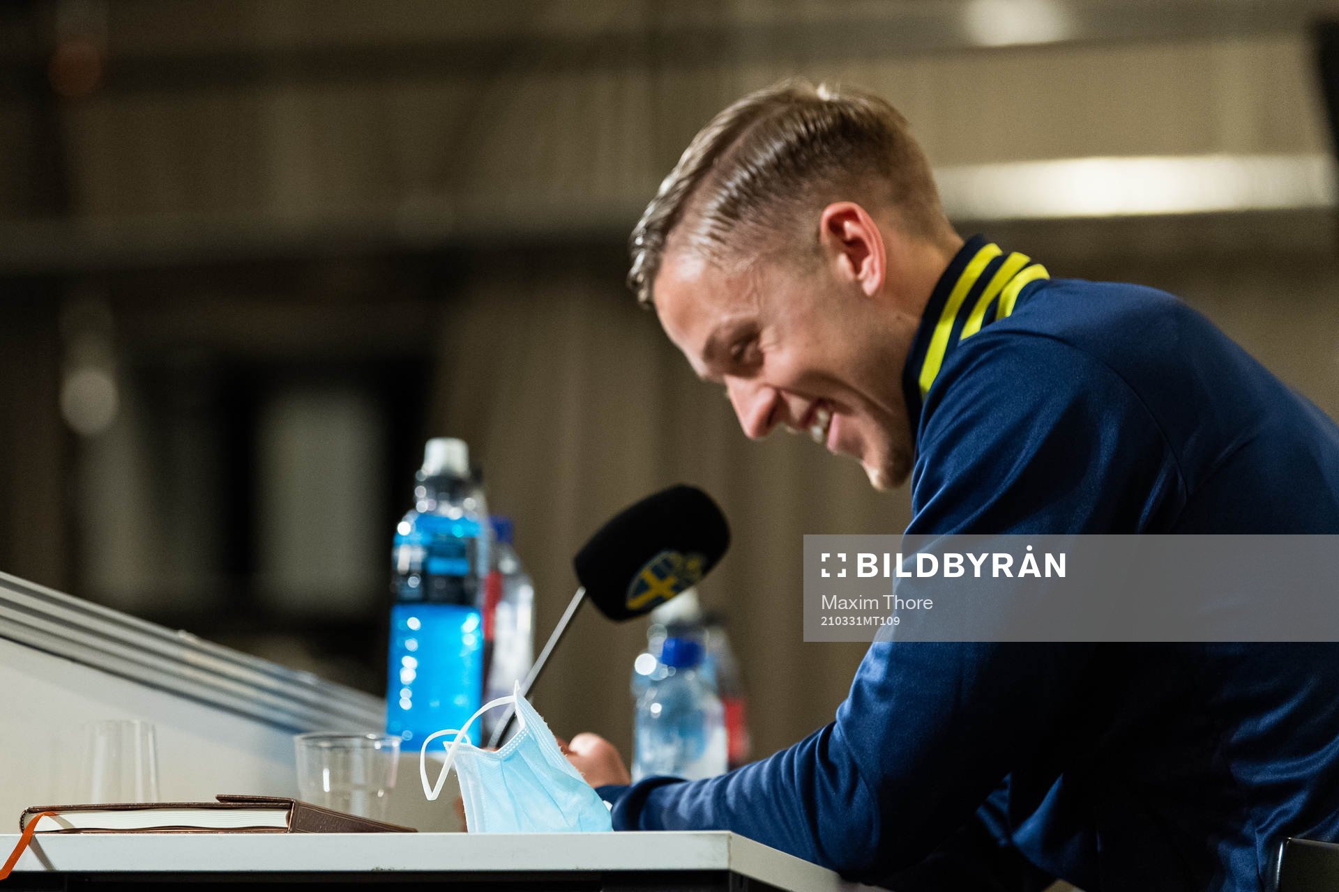 A face mask in front of Jesper Karlsson of Sweden