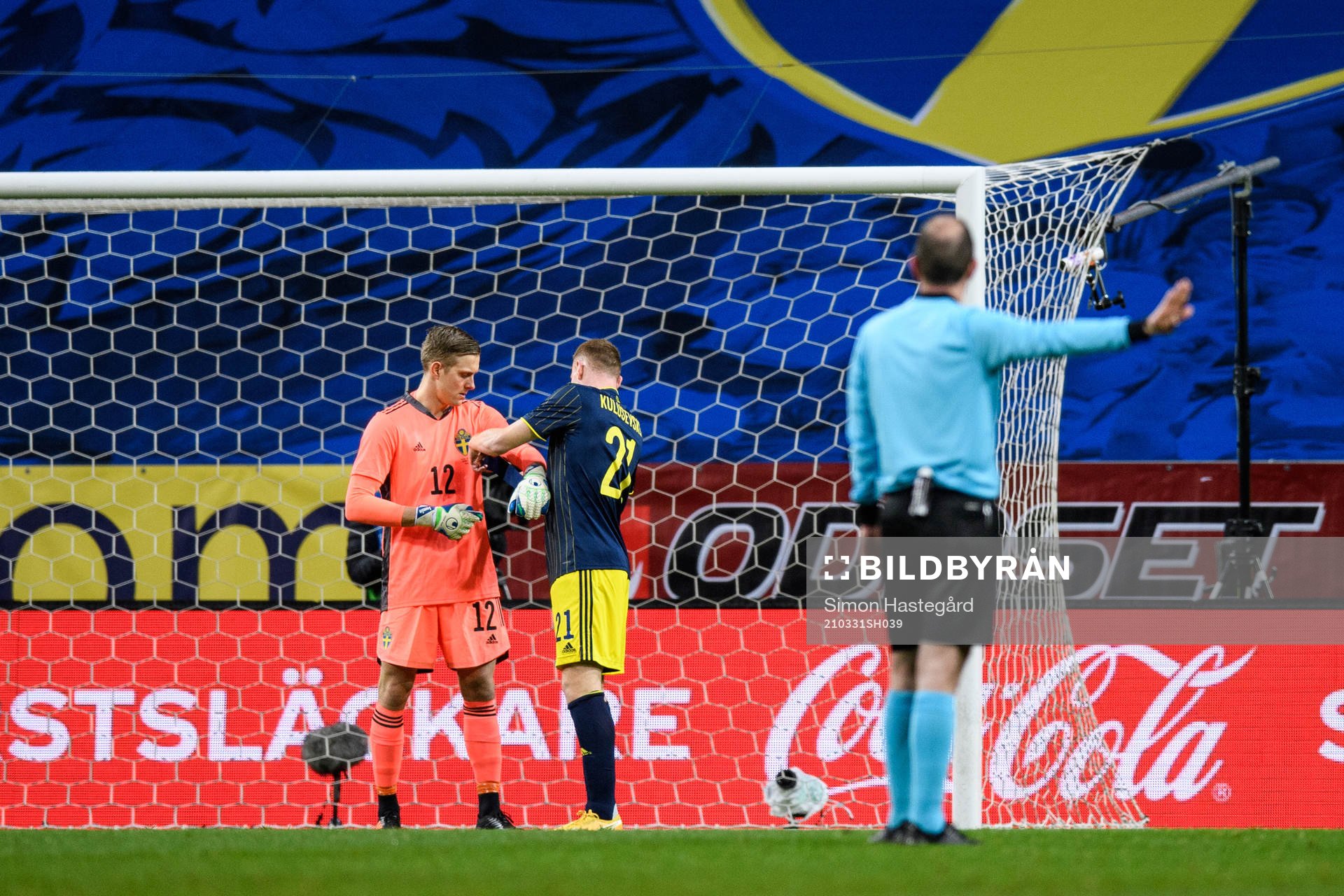 goalkeeper Karl-Johan Johnsson receives the captains