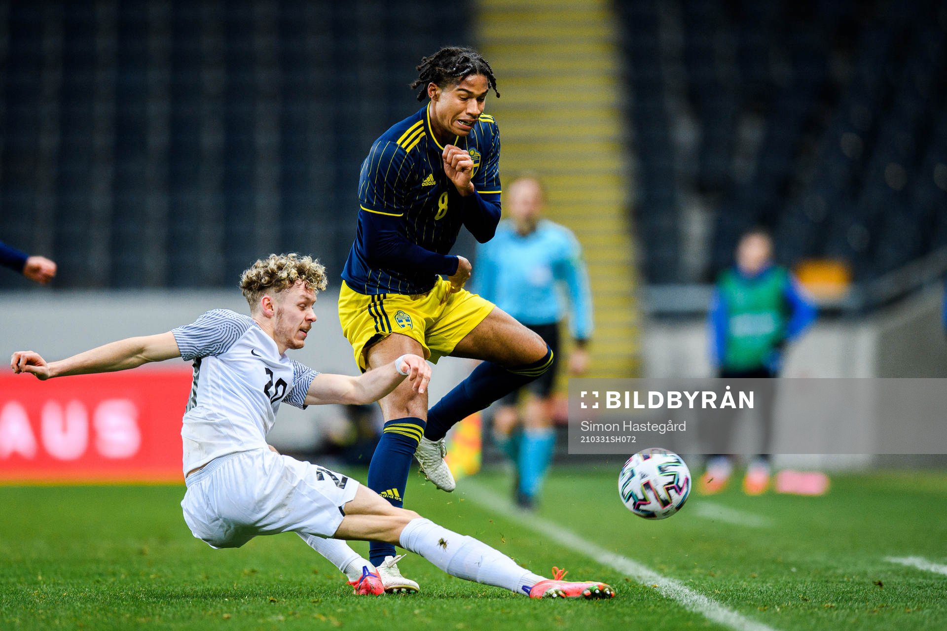 Markus Poom of Estonia and Jens-Lys Cajuste of Sweden