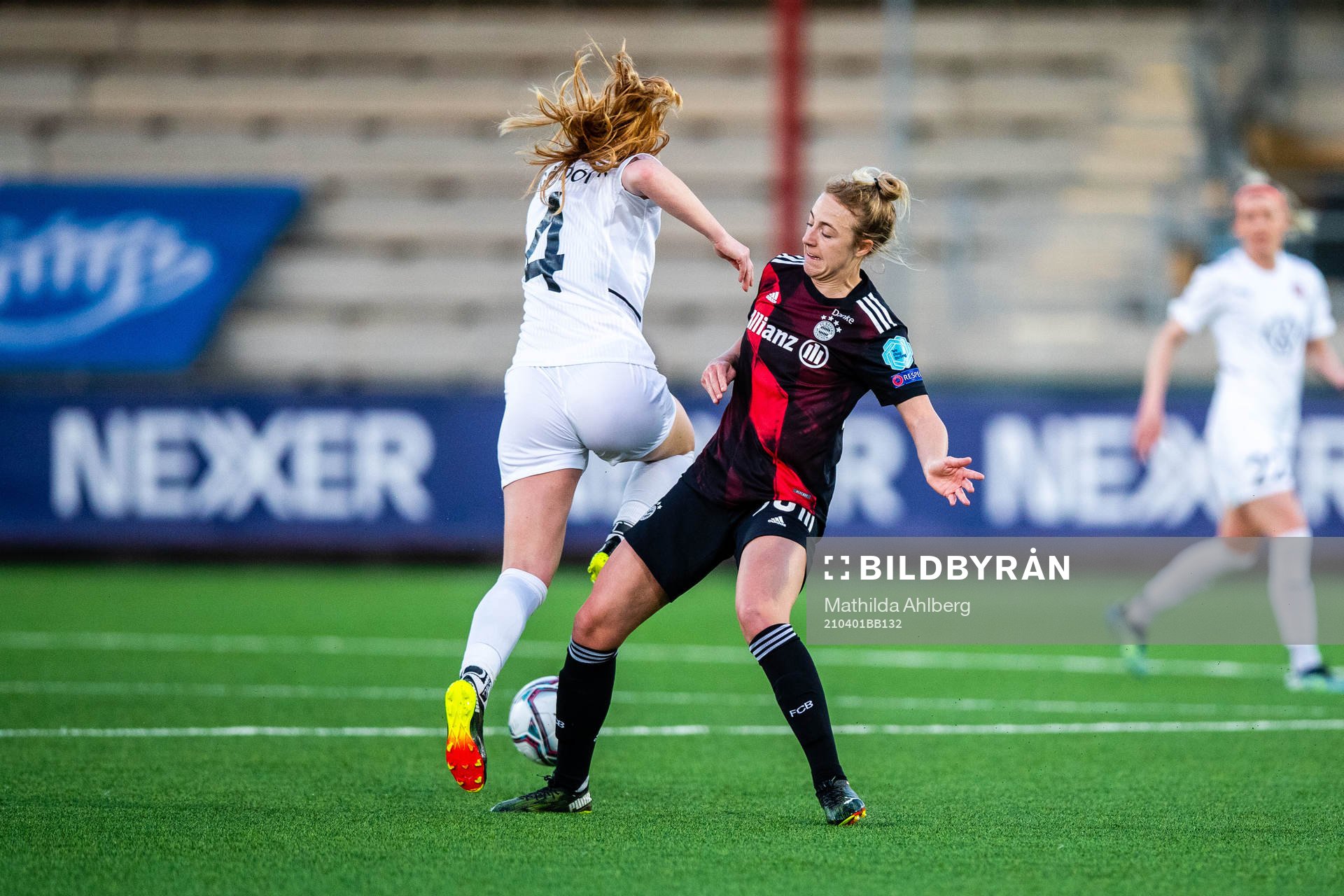 Glodis Perla Viggosdottir of Rosengård and Linda Ballmann of Bayern Munich during the UEFA Women's Champions League football match quarterfinal two between FC Rosengård and Bayern Munich on April 1, 2021 in Malmö.