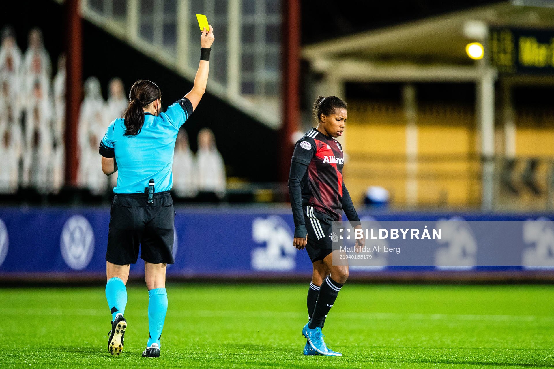 Lineth Beerensteyn of Bayern Munich gets a yellow card