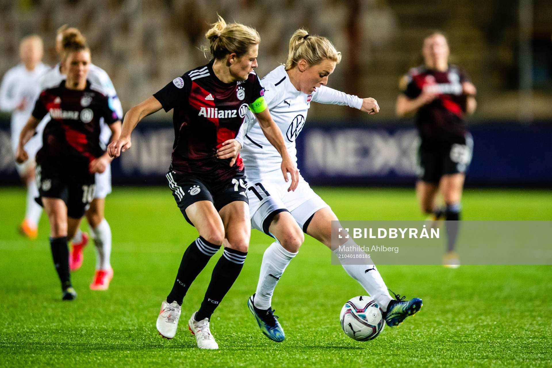 Carina Wenninger of Bayern Munich and Mimmi Larsson of Rosengård during the UEFA Women's Champions League football match quarterfinal two between FC Rosengård and Bayern Munich on April 1, 2021 in Malmö.