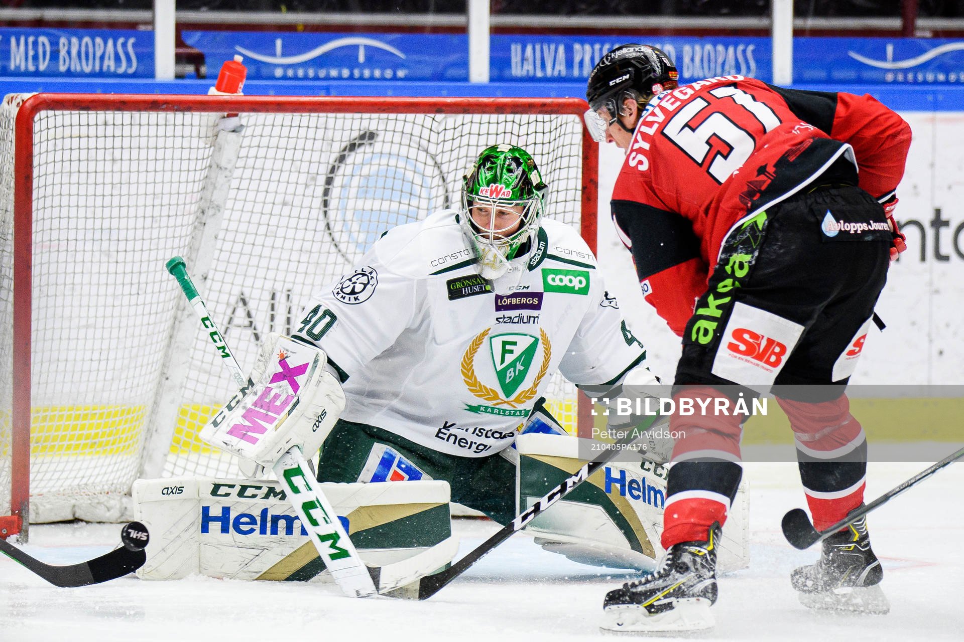 Färjestads målvakt Henrik Haukeland och Malmö Redhawks