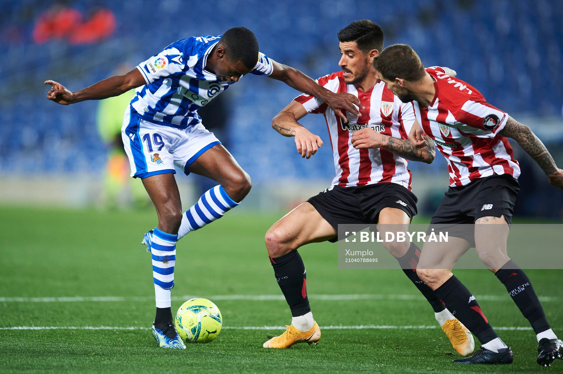 Alexander Isak of Real Sociedad duels for the ball with