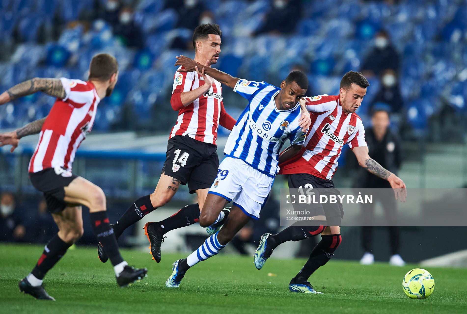 Alexander Isak of Real Sociedad duels for the ball with