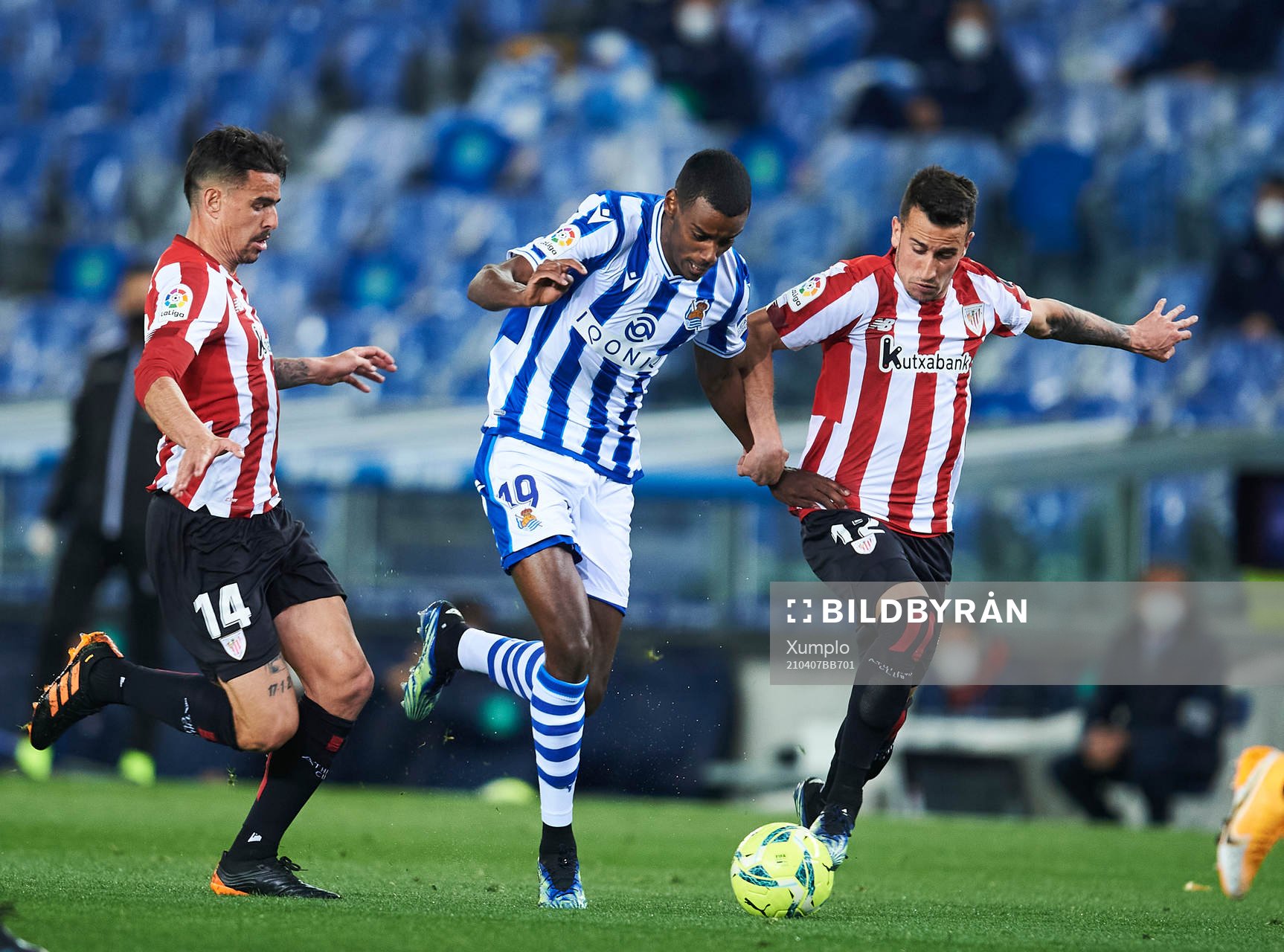 Alexander Isak of Real Sociedad duels for the ball with