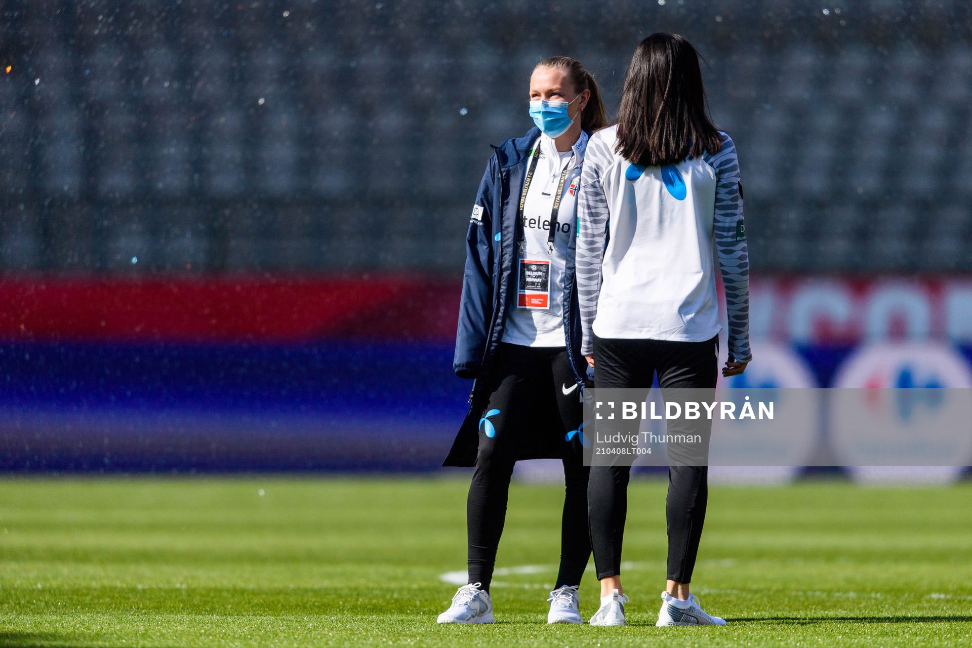 Frida Leonhardsen Maanum of Norway walk the pitch
