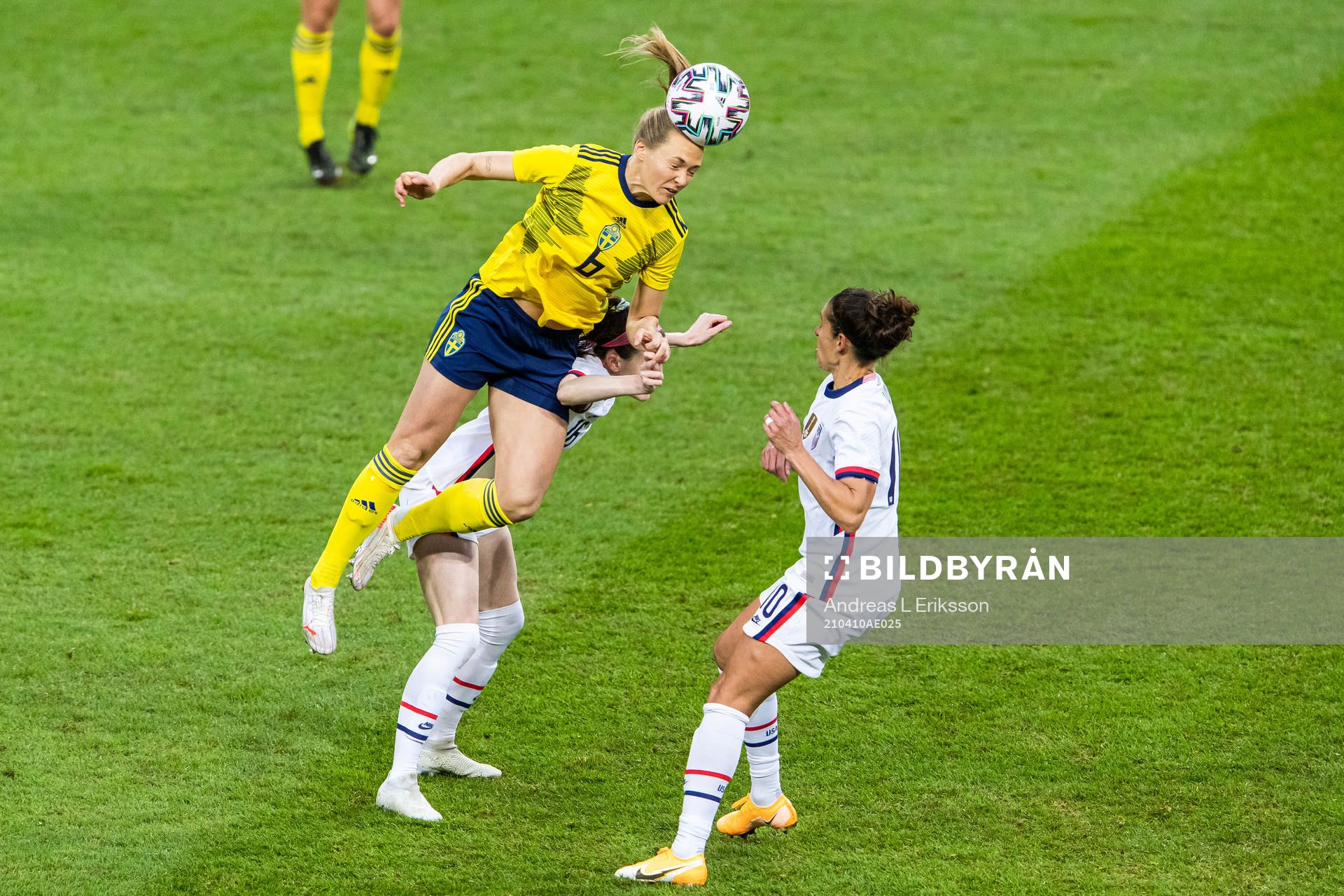Magdalena Eriksson of Sweden compete for the ball with Rose