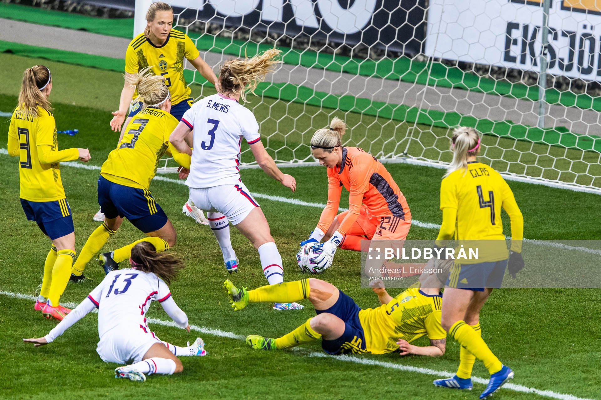Goalkeeper Jennifer Falk of Sweden denies a goal for Samantha Mewis of USA during the women's international friendly football match between Sweden and USA on April 10, 2021 in Stockholm.