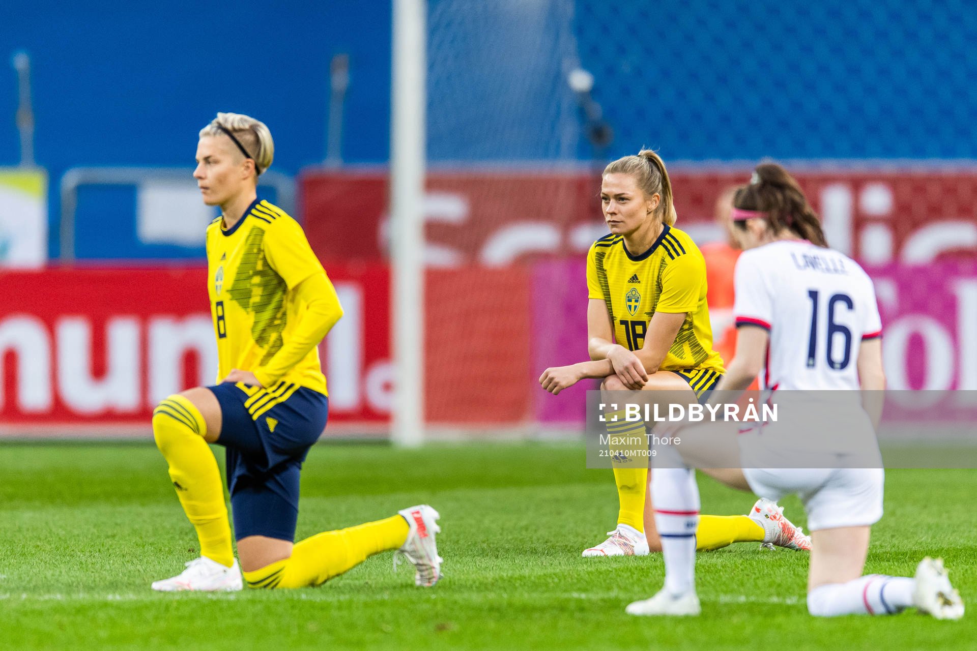 Fridolina Rolfö of Sweden takes a knee in support of the