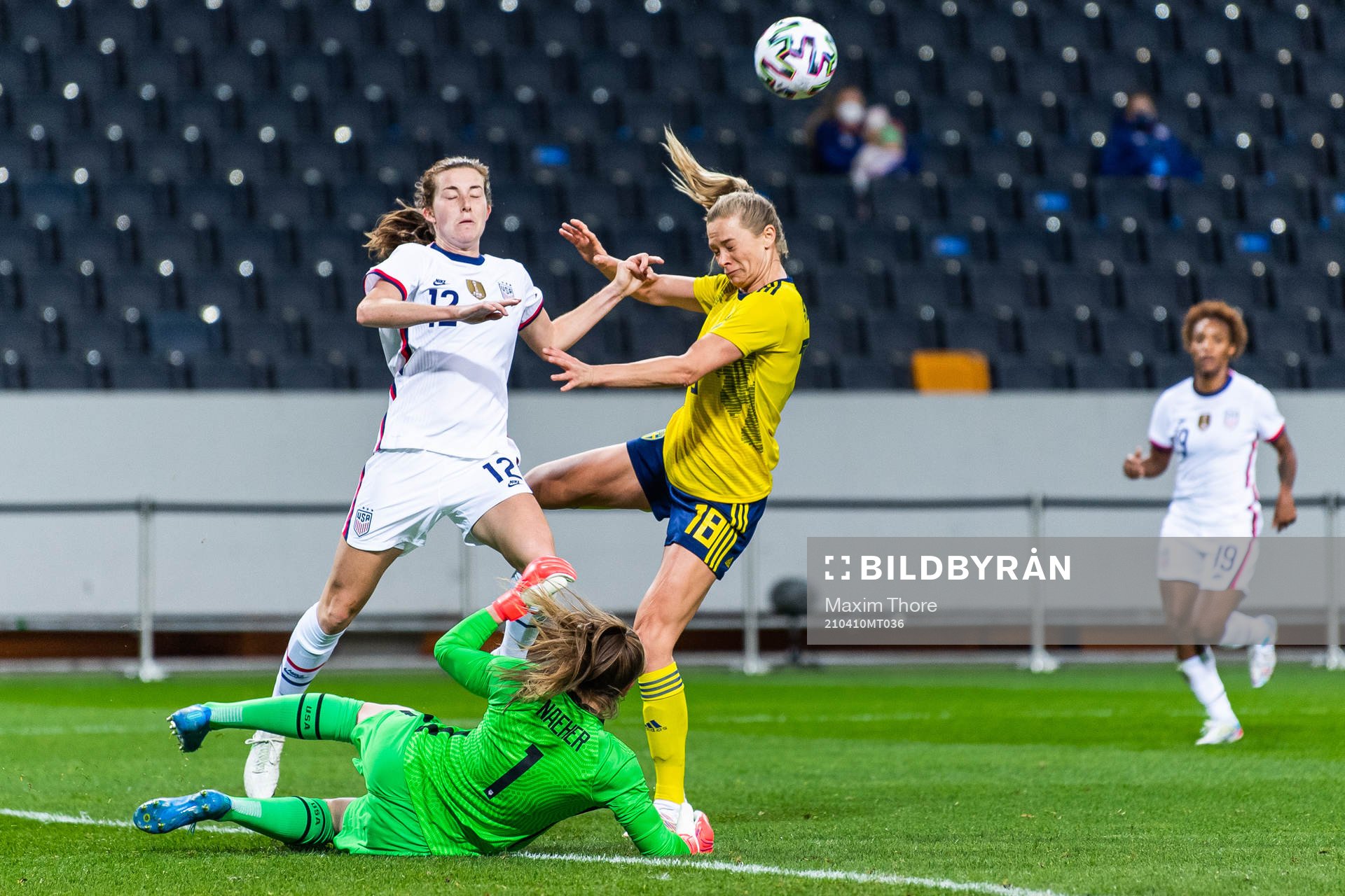 goalkeeper Alyssa Naeher and Tierna Davidson of USA against