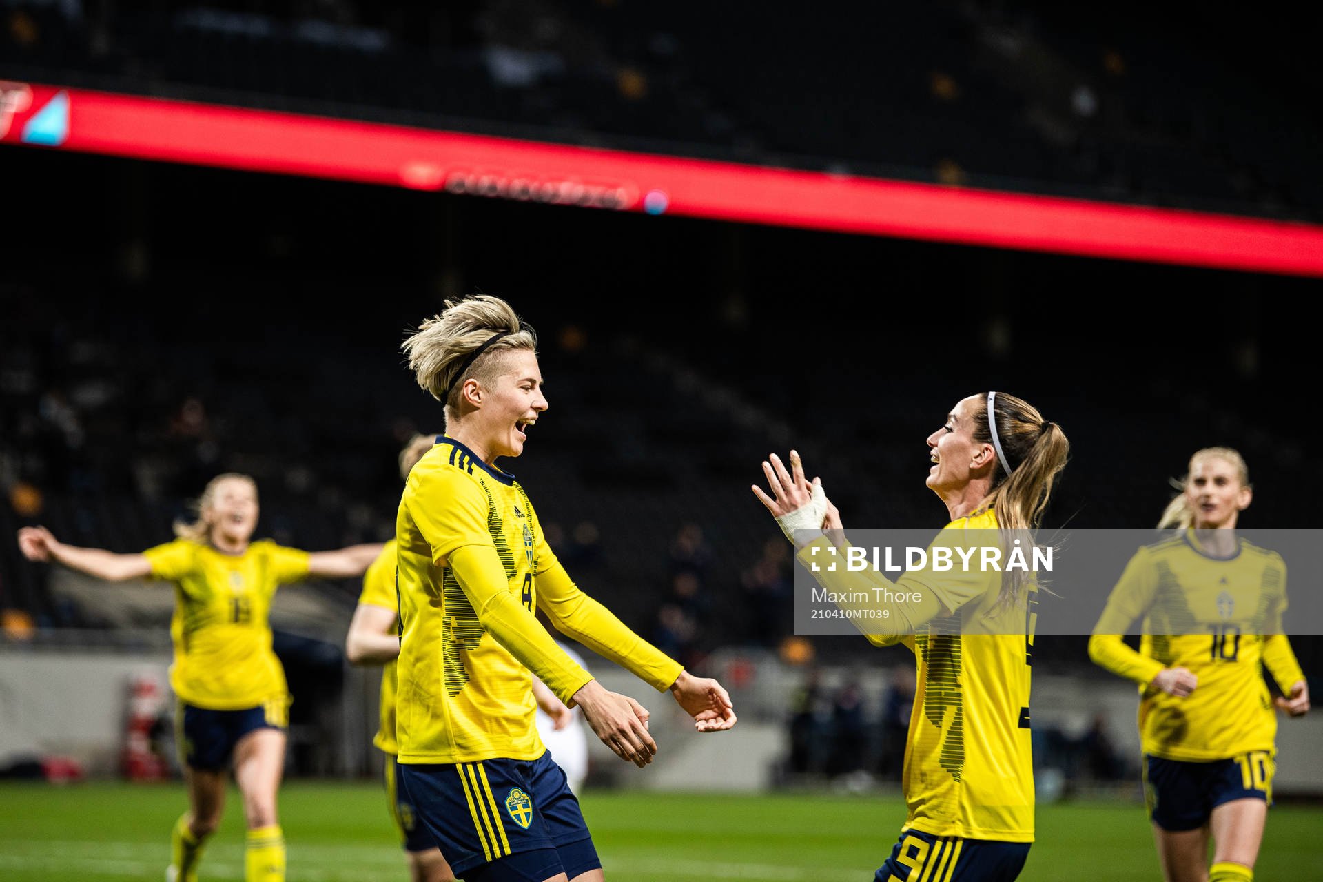 Lina Hurtig celebrates with Kosovare Asllani of Sweden