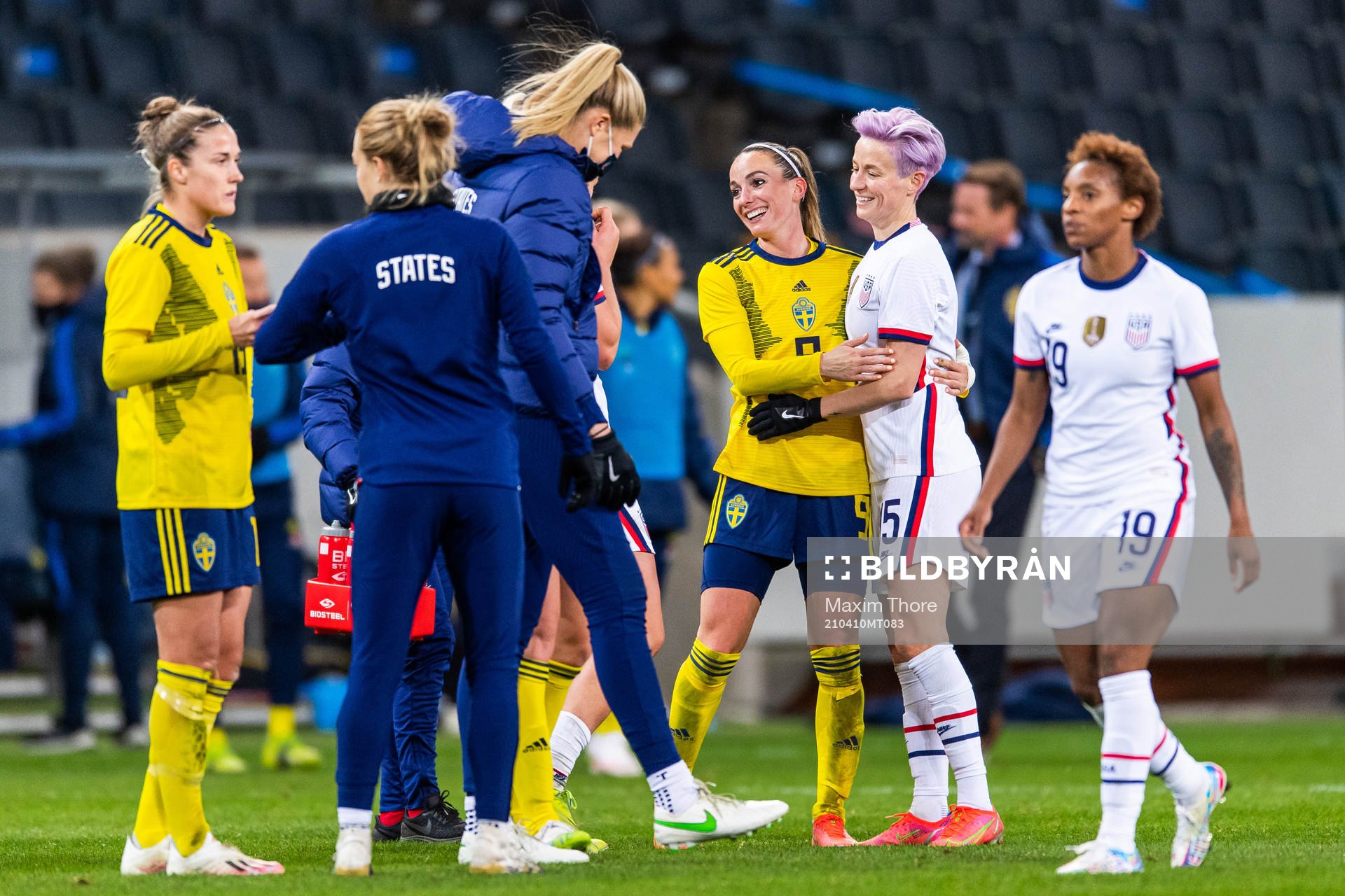 Kosovare Asllani of Sweden and Megan Rapinoe of USA