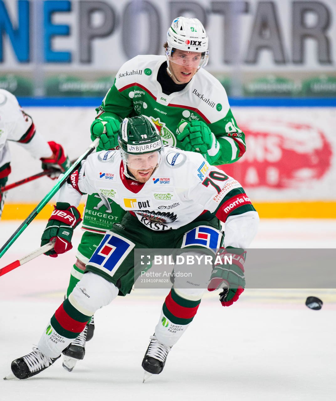 Rögles Adam Tambellini och Frölundas Christoffer Ehn