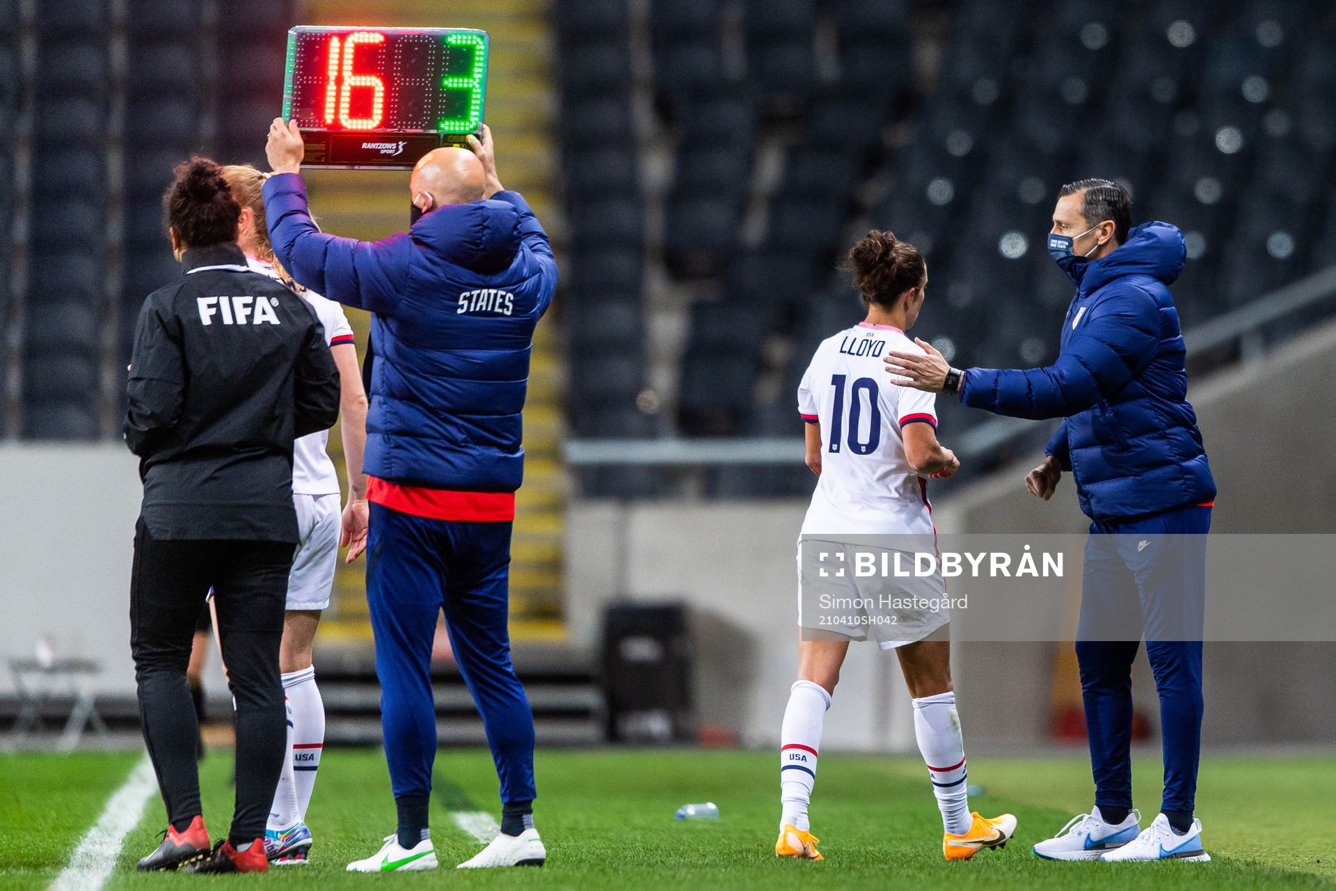 Carli Lloyd of USA is met by Vlatko Andonovski, head coach