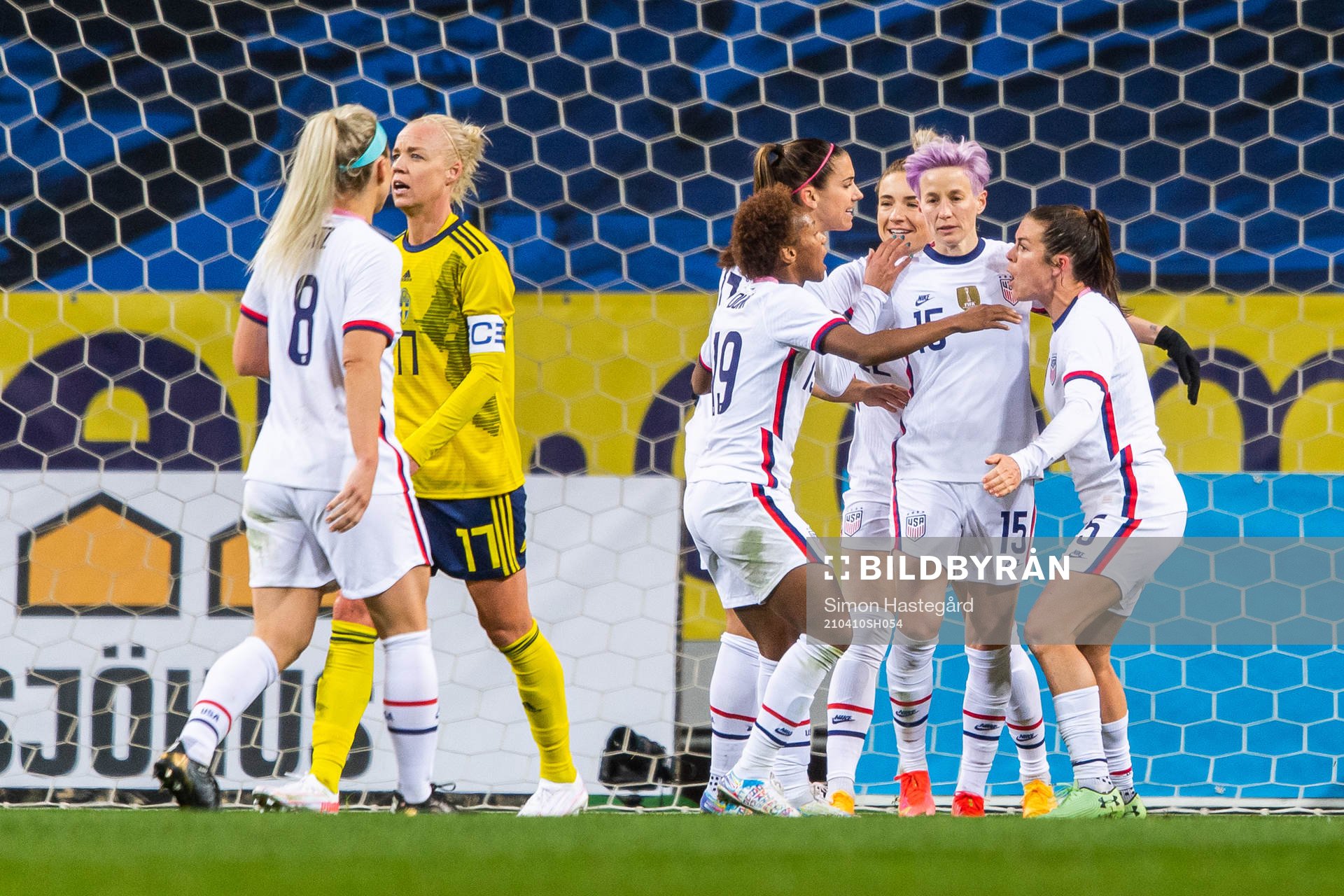 Megan Rapinoe of USA celebrates with team mates