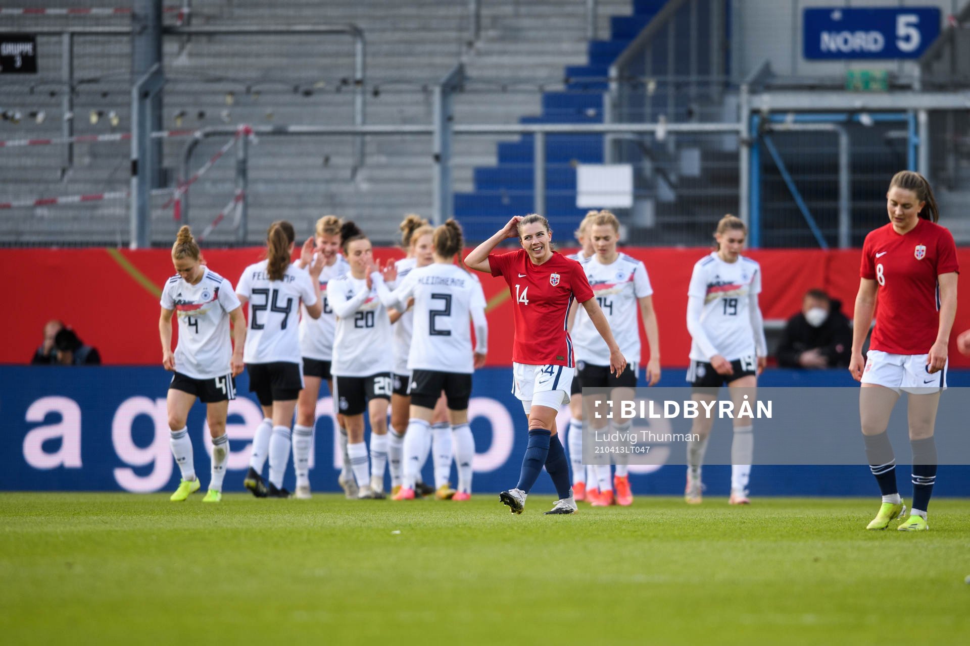 Cecilie Redisch Kvamme of Norway look dejected as the