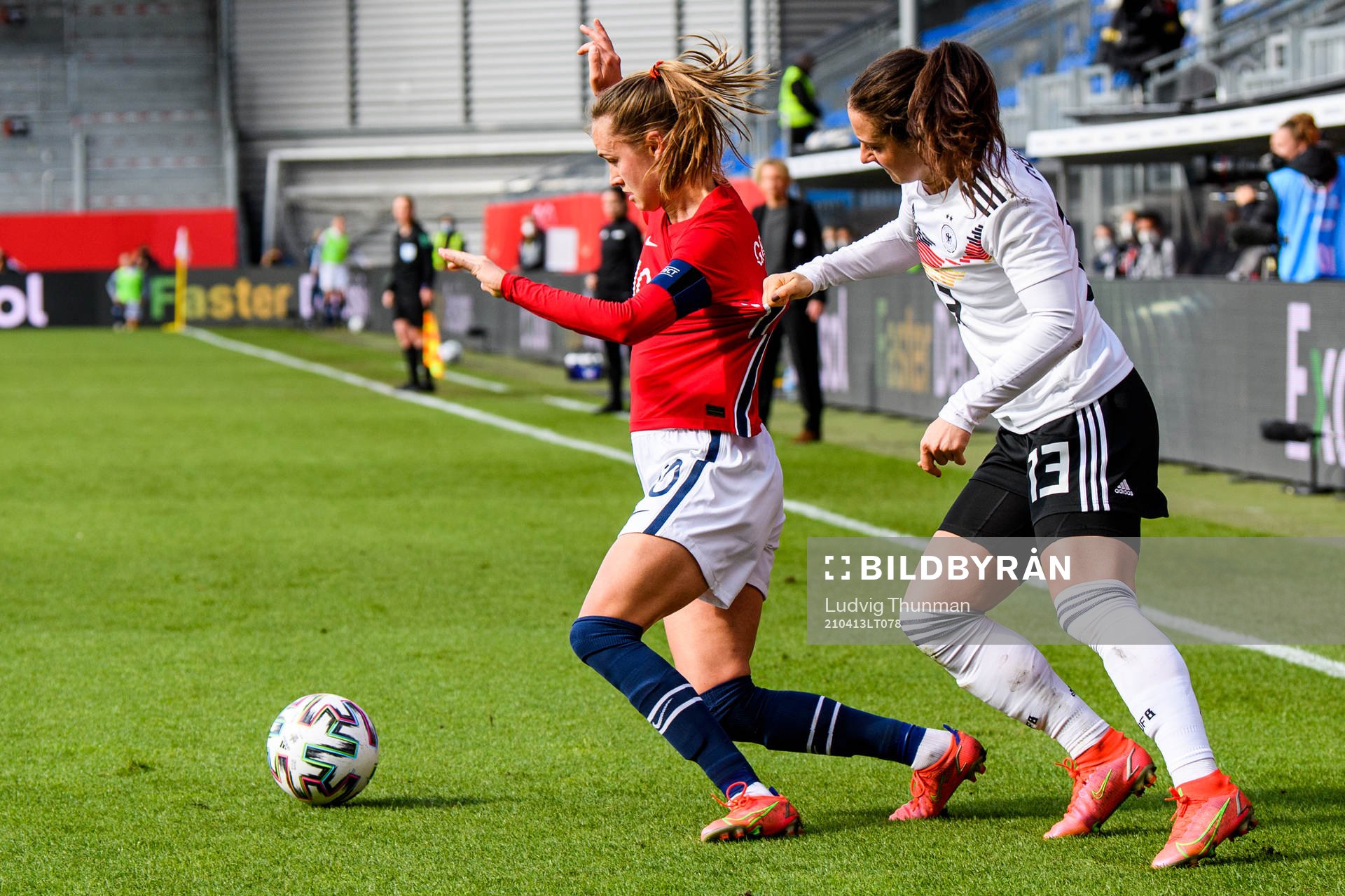 Caroline Graham Hansen of Norway and Sara Däbritz of Germany during the international friendly football match between Germany and Norway on April 13, 2021 in Wiesbaden.