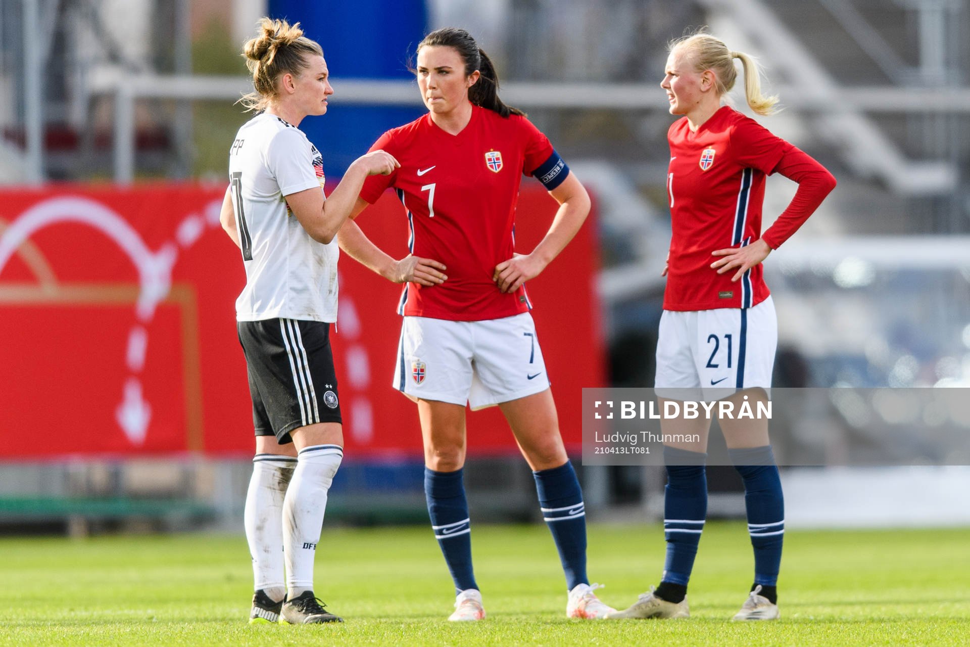 Alexandra Popp of Germany speaks with Ingrid Syrstad Engen