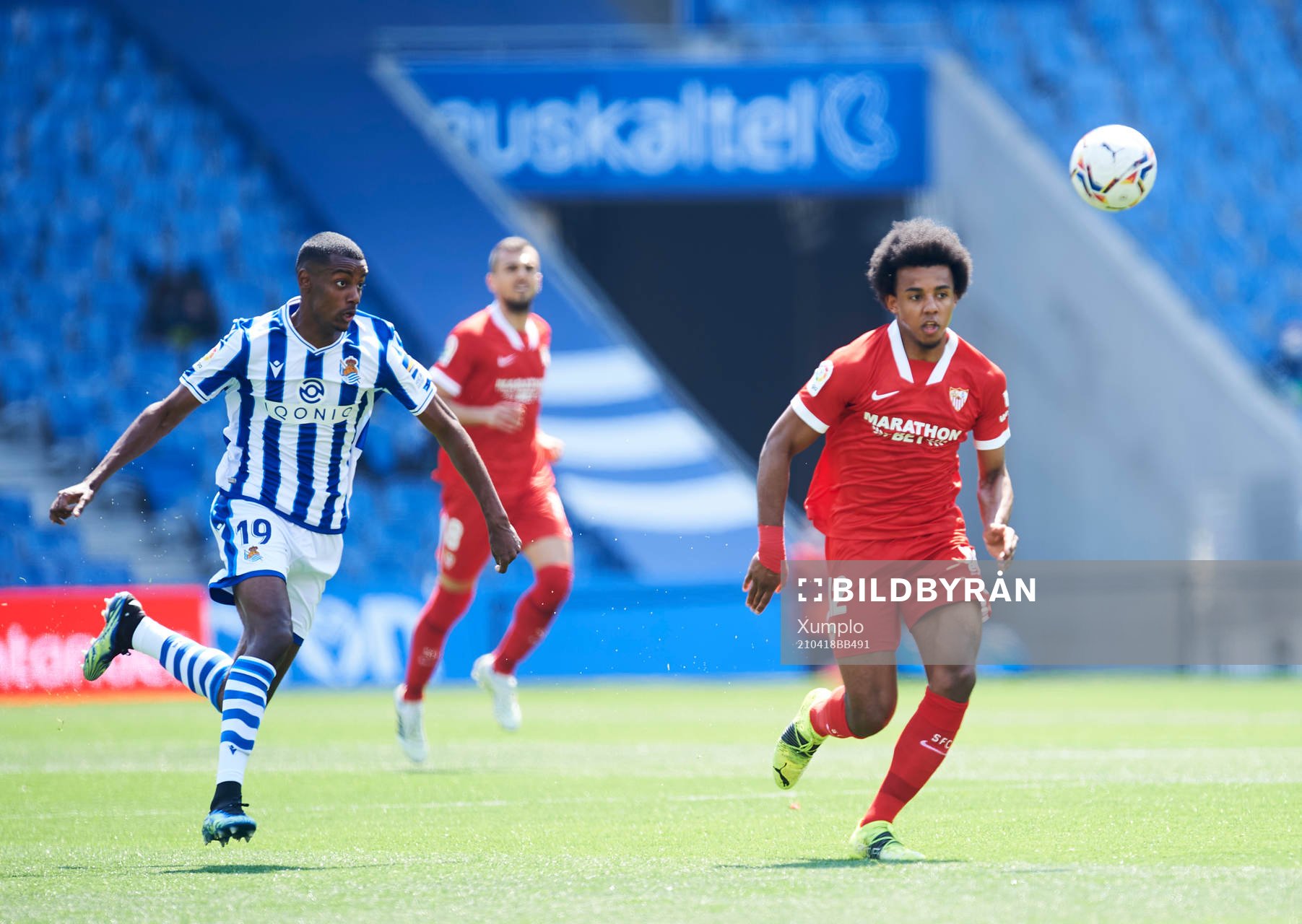 Alexander Isak of Real Sociedad duels for the ball with