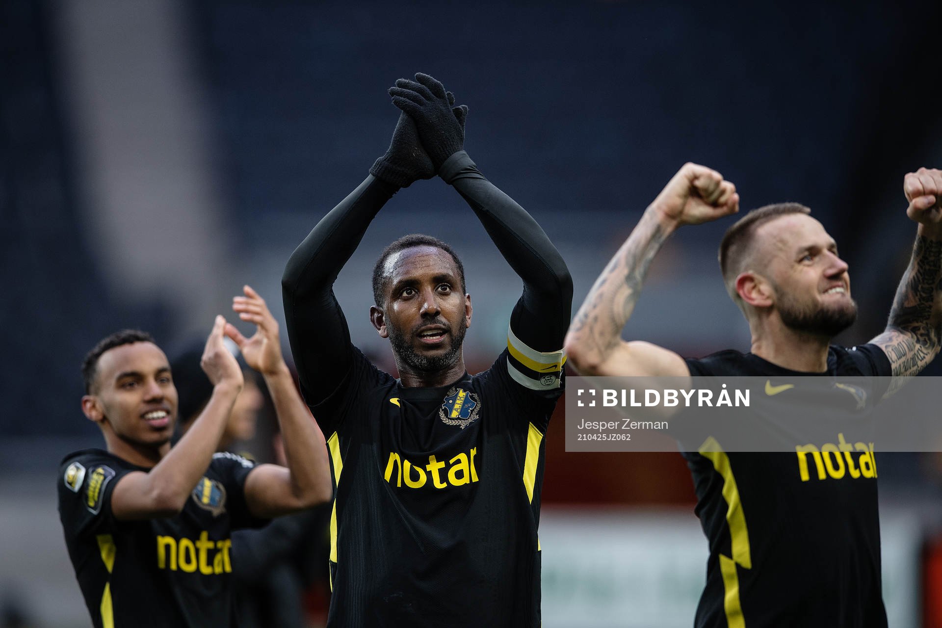 AIK:s Bilal Hussein, Henok Goitom och Alexander Milosevic jublar efter fotbollsmatchen i Allsvenskan mellan AIK och Hammarby den 25 april 2021 i Stockholm.