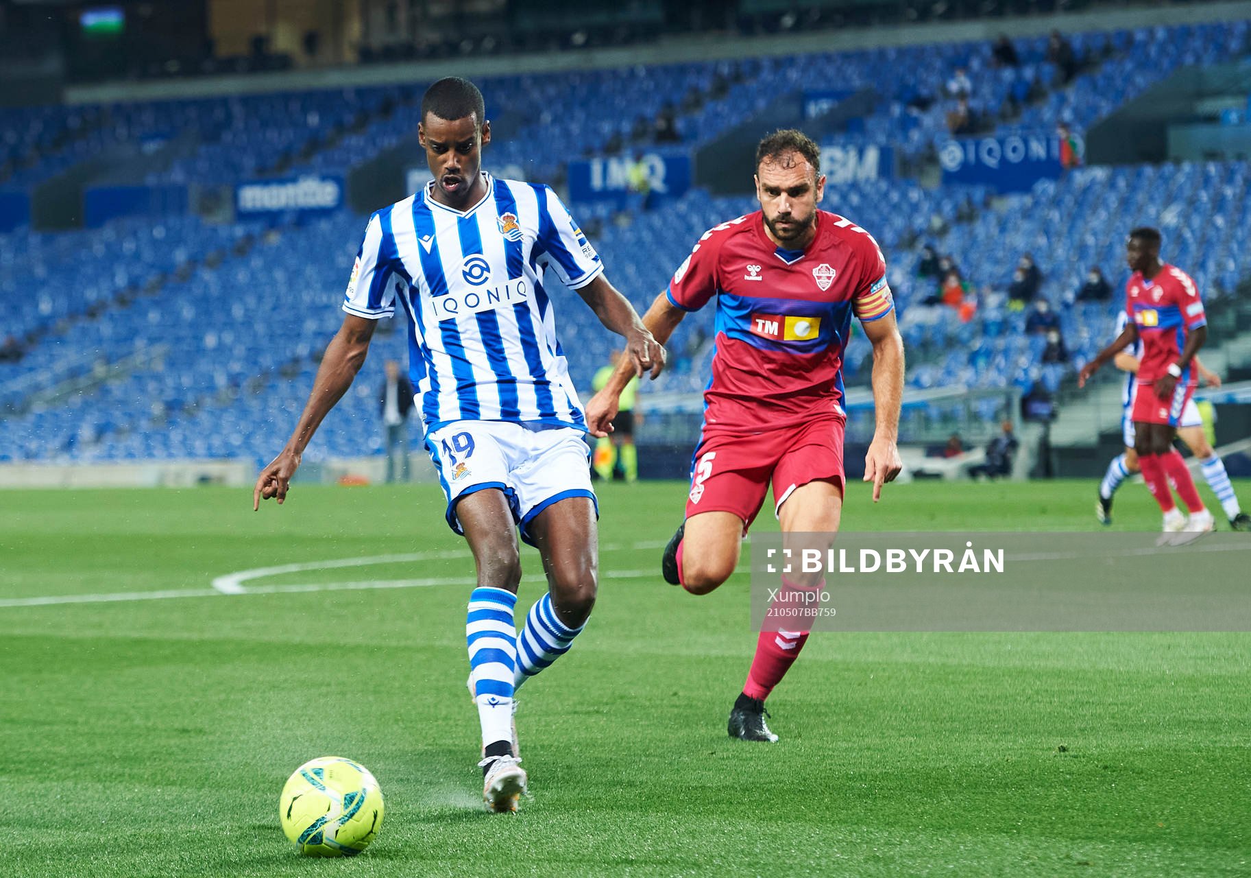 Alexander Isak of Real Sociedad duels for the ball with