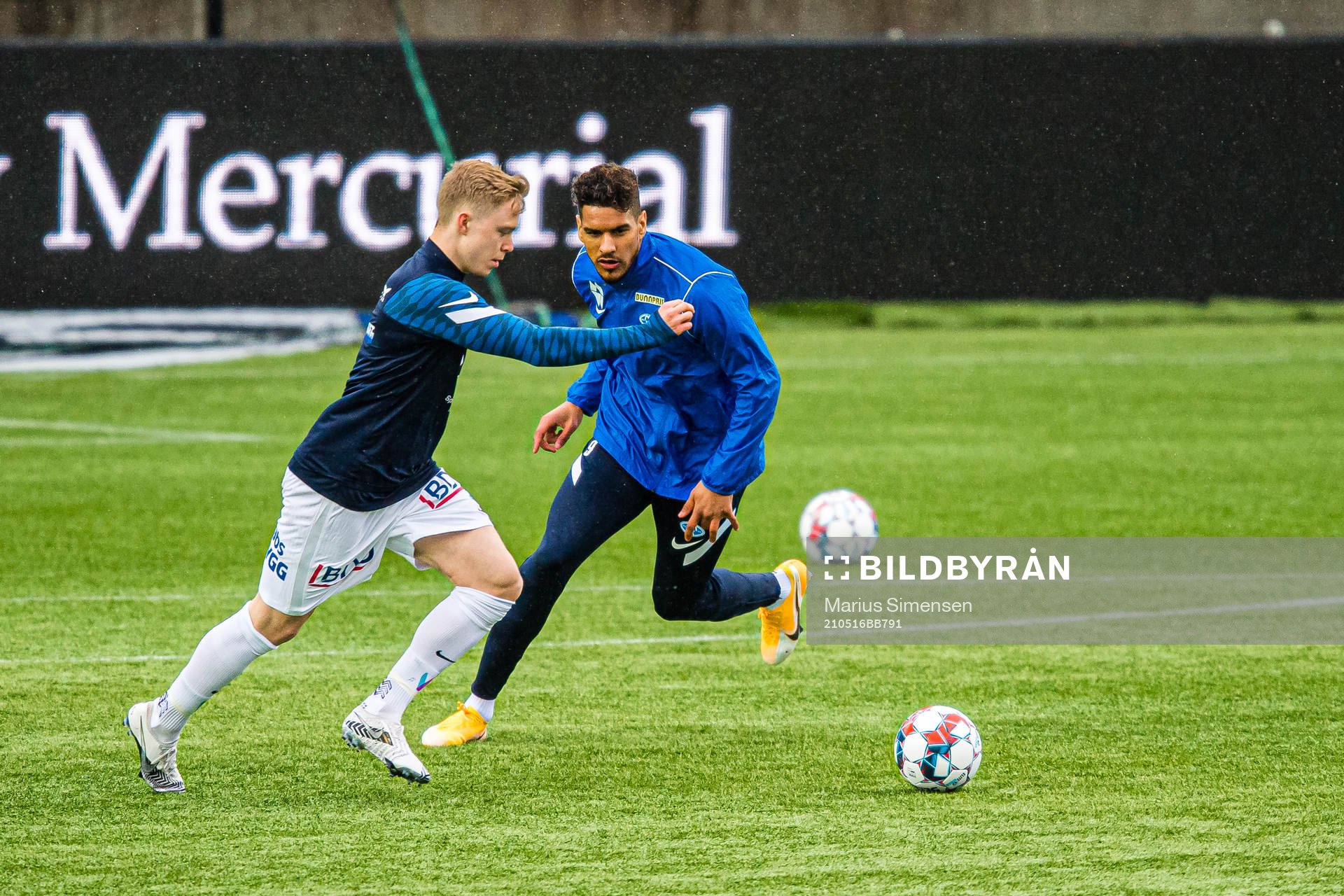 Ola Brynhildsen and Ohikhuaeme Anthony Omoijuanfo of Molde