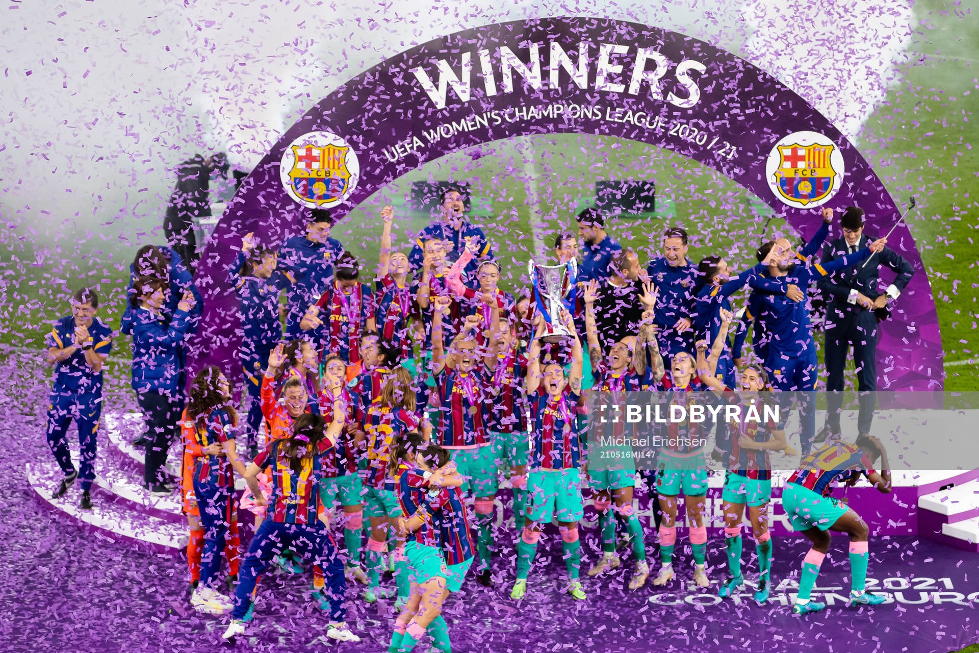 Barcelona celebrates with the trophy