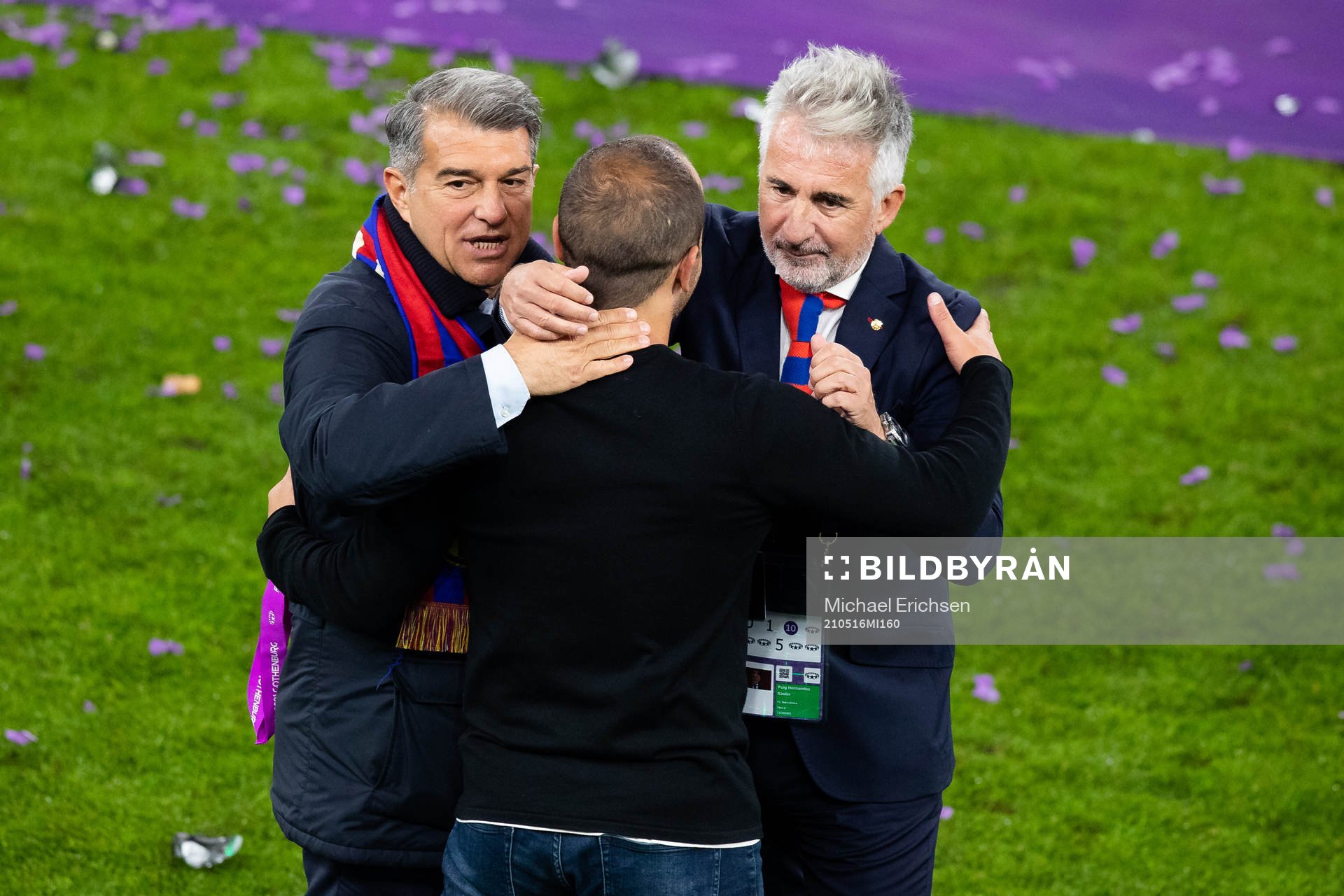 President Joan Laporta, coach Lluis Cortes and director