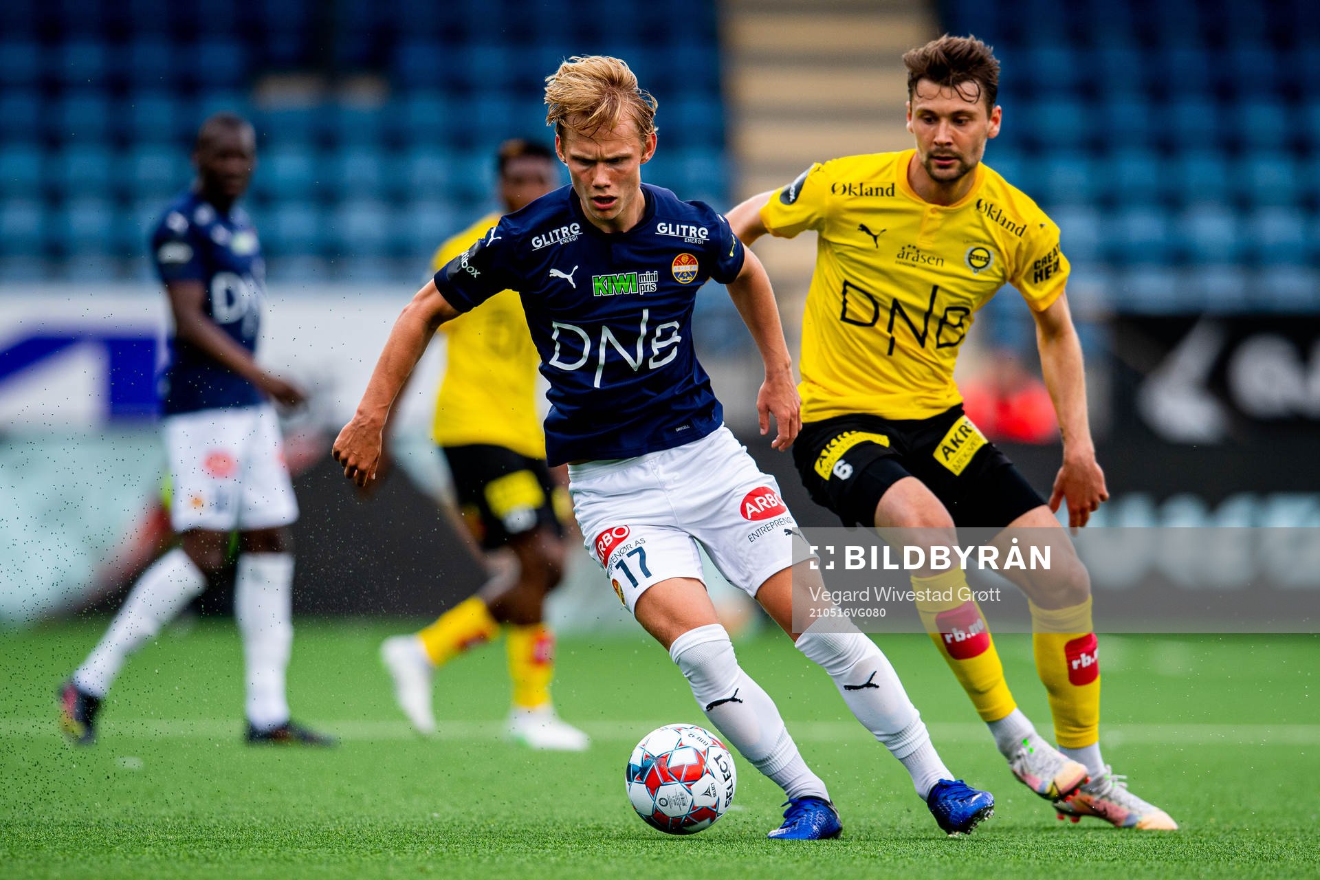 Tobias Fjeld Gulliksen of Strømsgodset and Kaan Kairinen