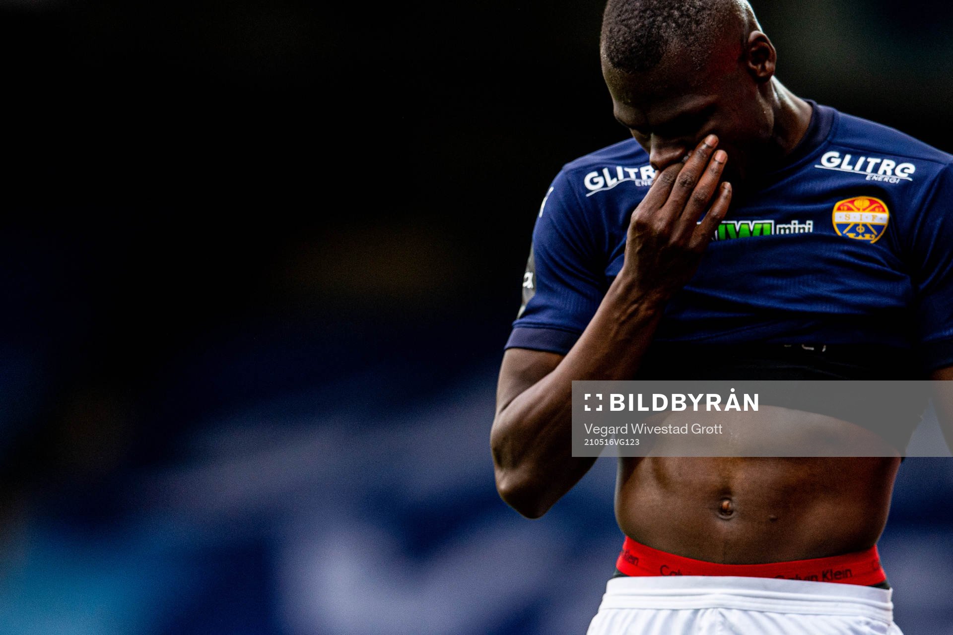 Moses Dramwi Mawa of Strømsgodset walks off the pitch with