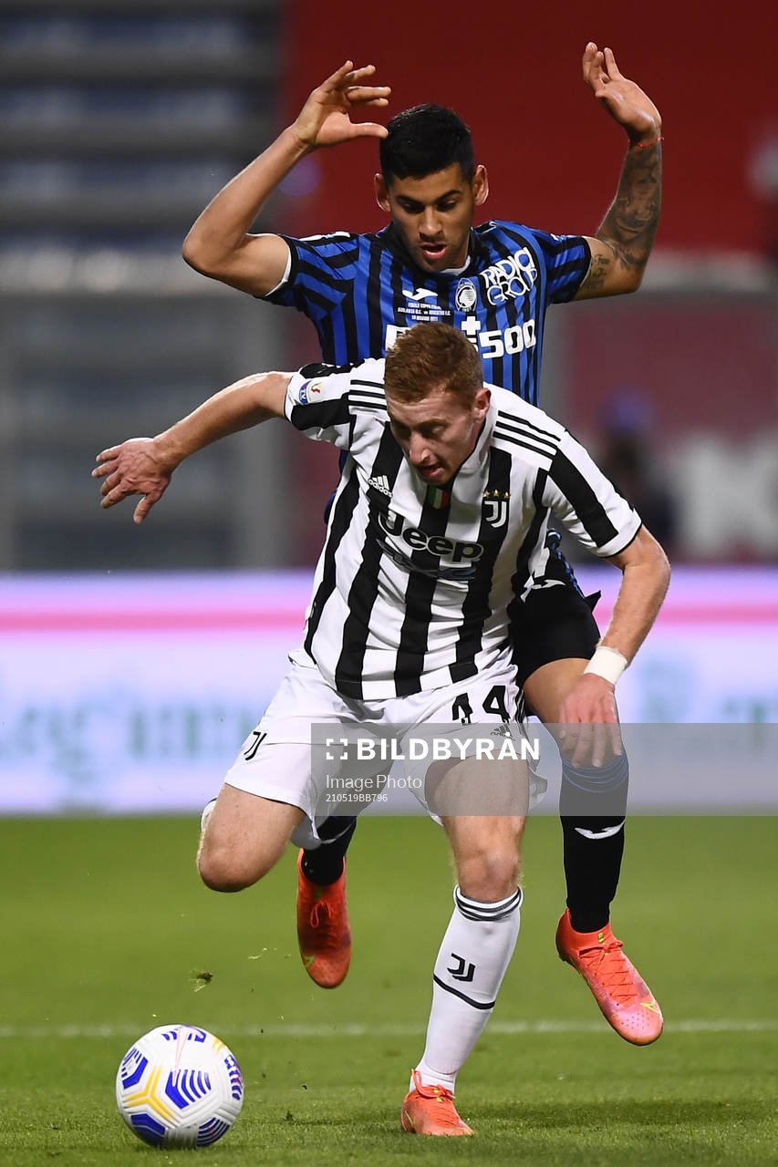 Dejan Kulusevski of Juventus and Cristian Romero of Atalanta