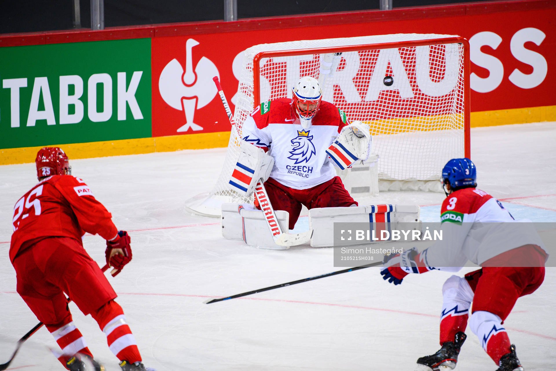 Mikhail Grigorenko of Russia  scores the 4-3 goal behind