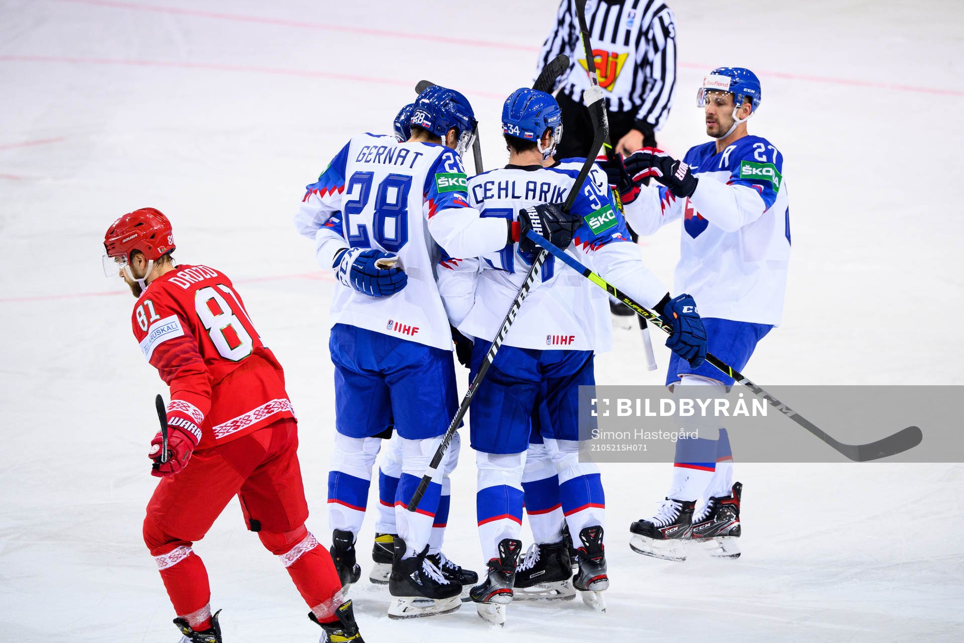 Peter Cehlarik and Marek Hrivik of Slovakia celebrate the