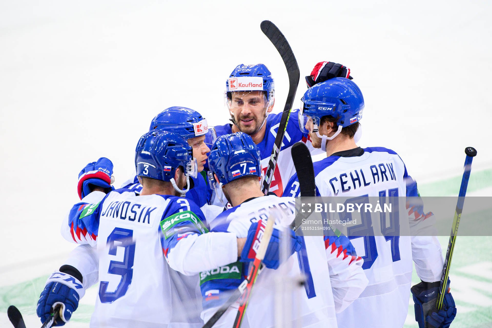 Marek Hrivik and Peter Cehlarik of Slovakia celebrate the
